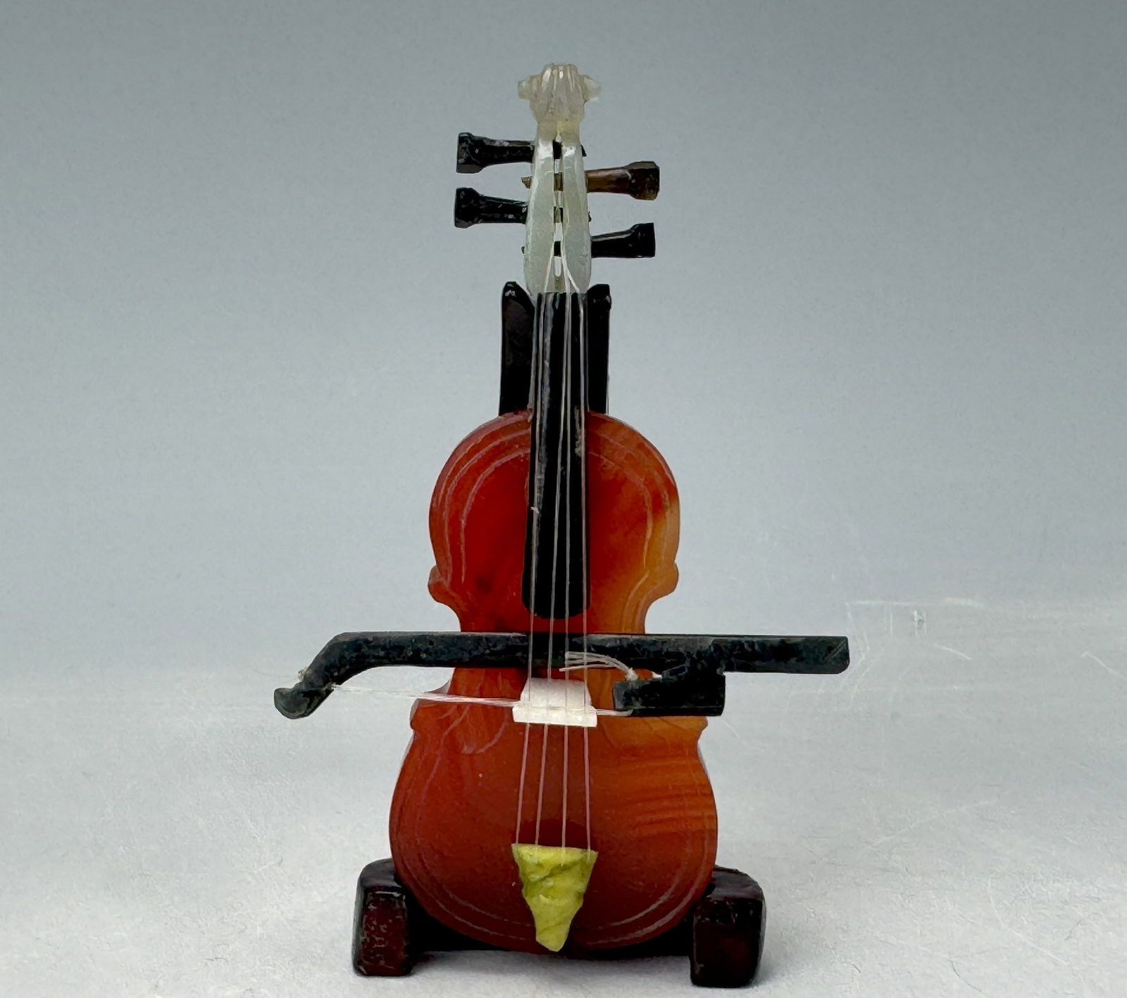 A Miniature Model Violin Made of Jade and Agate: A Miniature Model Violin Made of Jade and Agate,H 7cm(2.8 in.),Preview from Feb.17th to 21st from 1:00 PM TO 5:00 PM Eastern Time, Location: 15229 Display Court, Rockville MD 20850.