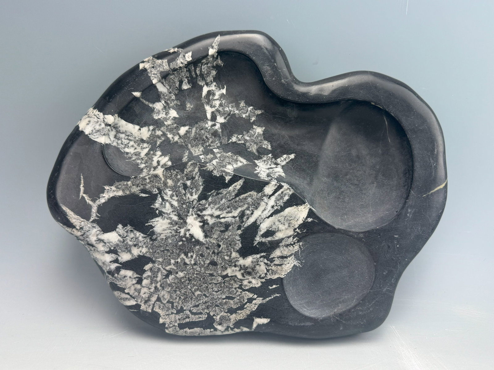 A Chinese Chrysanthemum Inkstone: Chinese Chrysanthemum Inkstone,L 26 cm(10.2 in.) x W 24 cm(9.5 in.).Preview from Feb.17th to 21st from 1:00 PM TO 5:00 PM Eastern Time, Location: 15229 Display Court, Rockville MD 20850.