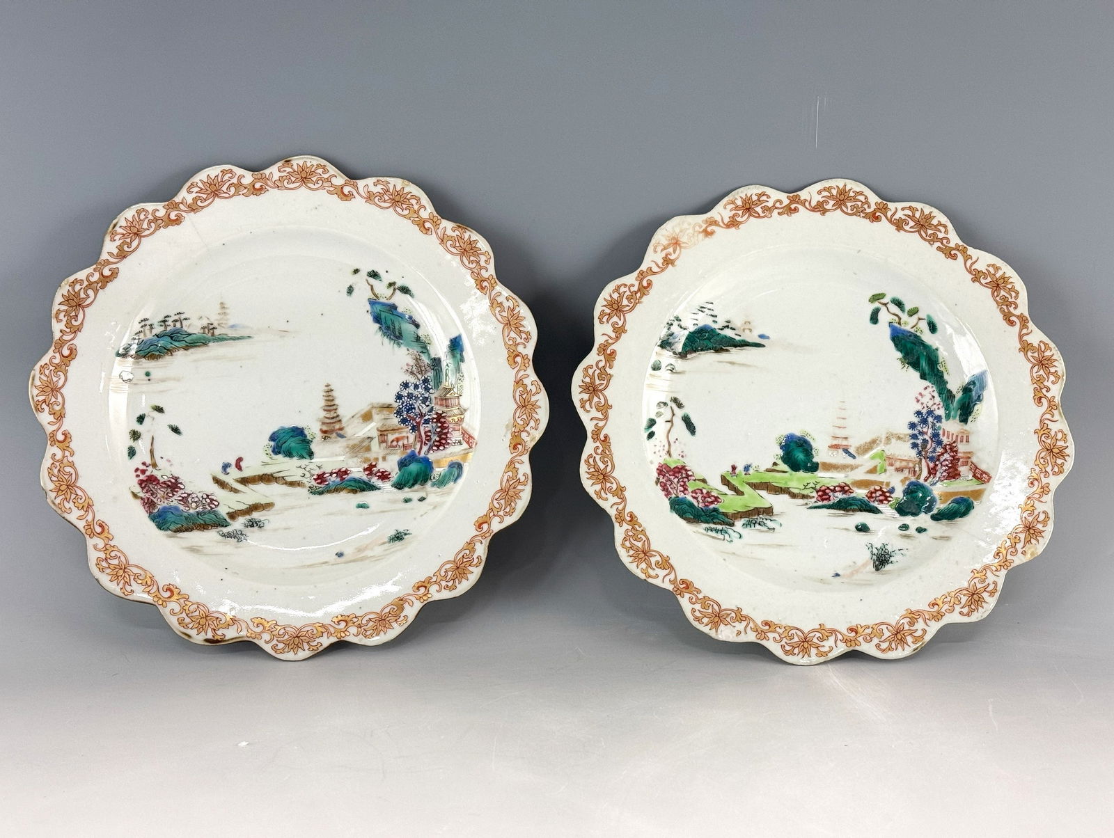 Pair of Chinese Famille Rose Porcelain Plates 19th Century: Pair Chinese famille rose lobbed plates painted in landscape. 19th century export ware, D 23 cm(9 in.) ,Preview from Feb.17th to 21st from 1:00 PM TO 5:00 PM Eastern Time, Location: 15229 Display Cour