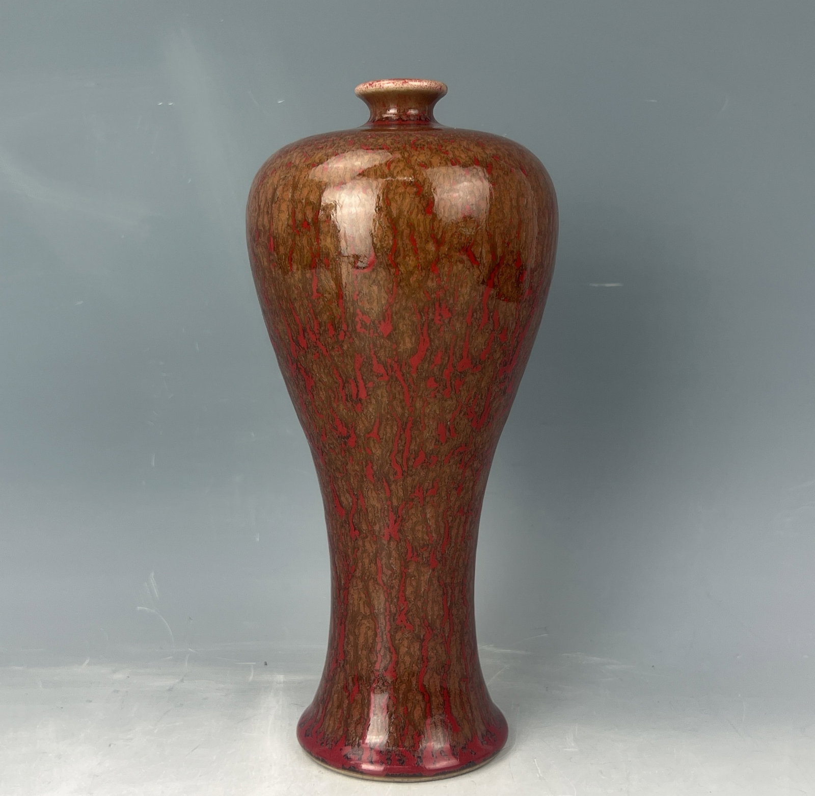 Chinese Porcelain Red Beauty Drunk Glaze Plum Vase: Chinese Porcelain Red Beauty Drunk Glaze Plum Vase,Kangxi Mark, H 26 cm(10.5 in.). Preview from Apr. 21st to 25th from 1:00 PM TO 5:00 PM Eastern Time, Location: 15229 Display Court, Rockville MD 2085