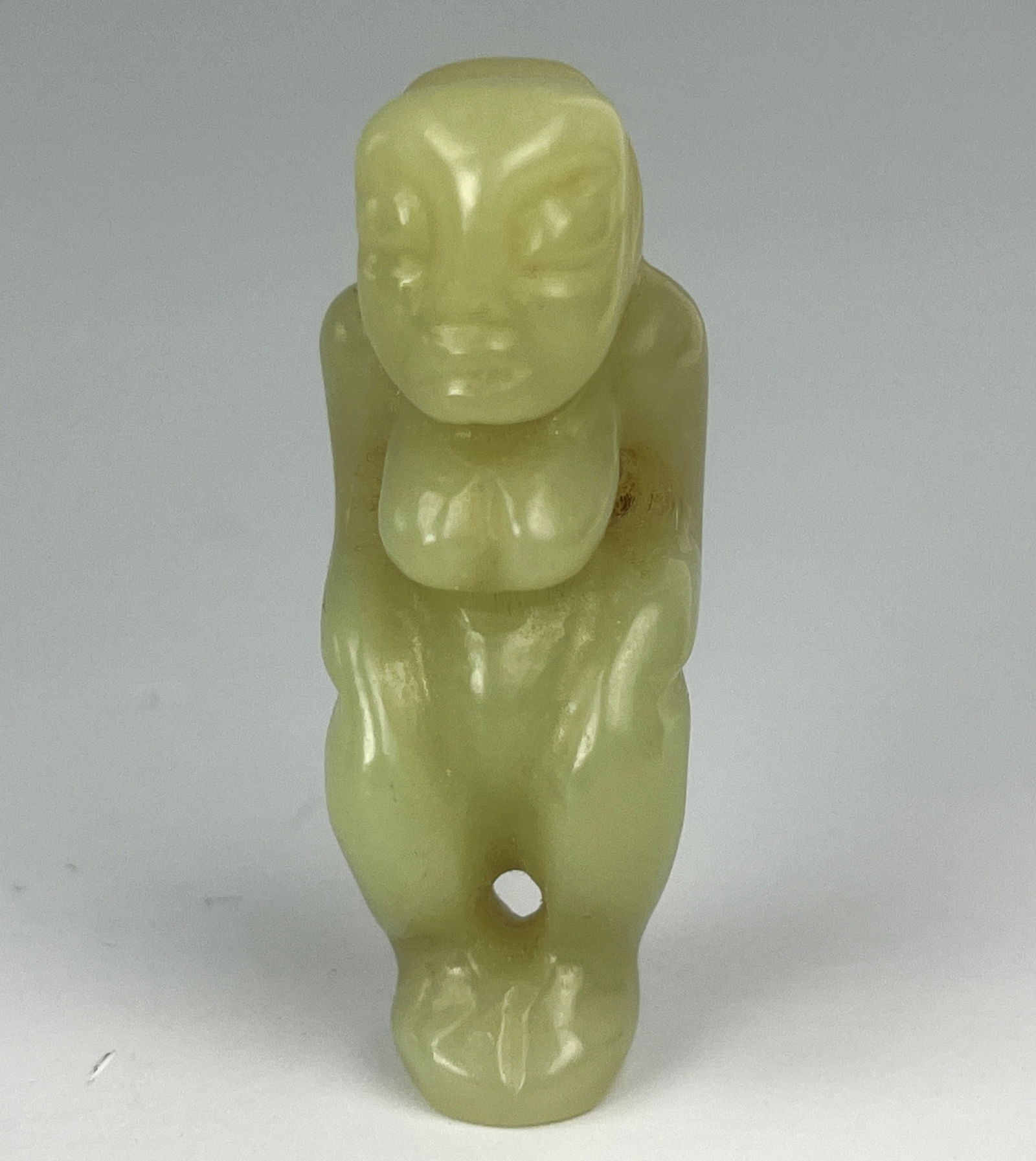 A Chinese Carved Celadon Jade Figurine (1 of 6)