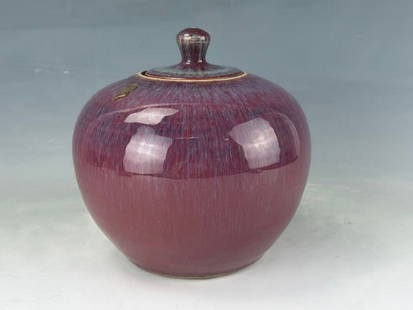A Chinese Red Glaze Porcelain Jar Lidded: A Chinese Red Glaze Porcelain Jar Lidded,H 23 cm(9 in.). Preview from Jun 23rd to 27th from 1:00 PM TO 5:00 PM Eastern Time, Location: 15229 Display Court, Rockville MD 20850.