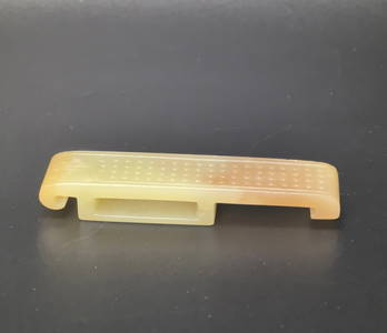 A Chinese Yellow Jade Sword Slide