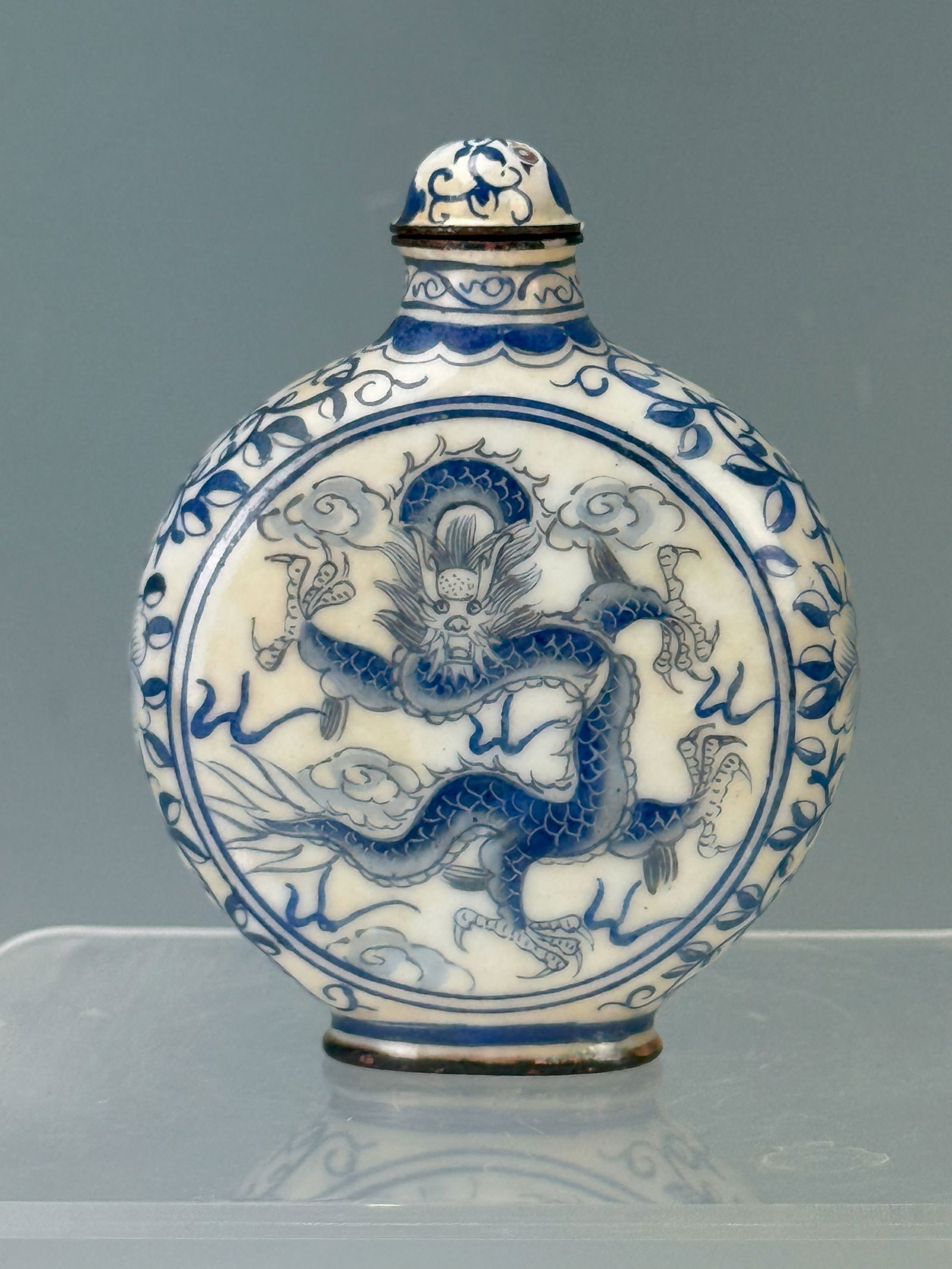 Chinese Enamel Blue and White Dragon Snuff Bottle Qianlong Mark: Chinese Enamel Blue and White Dragon Snuff Bottle Qianlong Mark,H 8 cm( 3 in.) x W 6 cm(2.5 in.). Preview from Oct .21st to 24th from 1:00 PM TO 5:00 PM Eastern Time, Location: 15229 Display Court, Ro