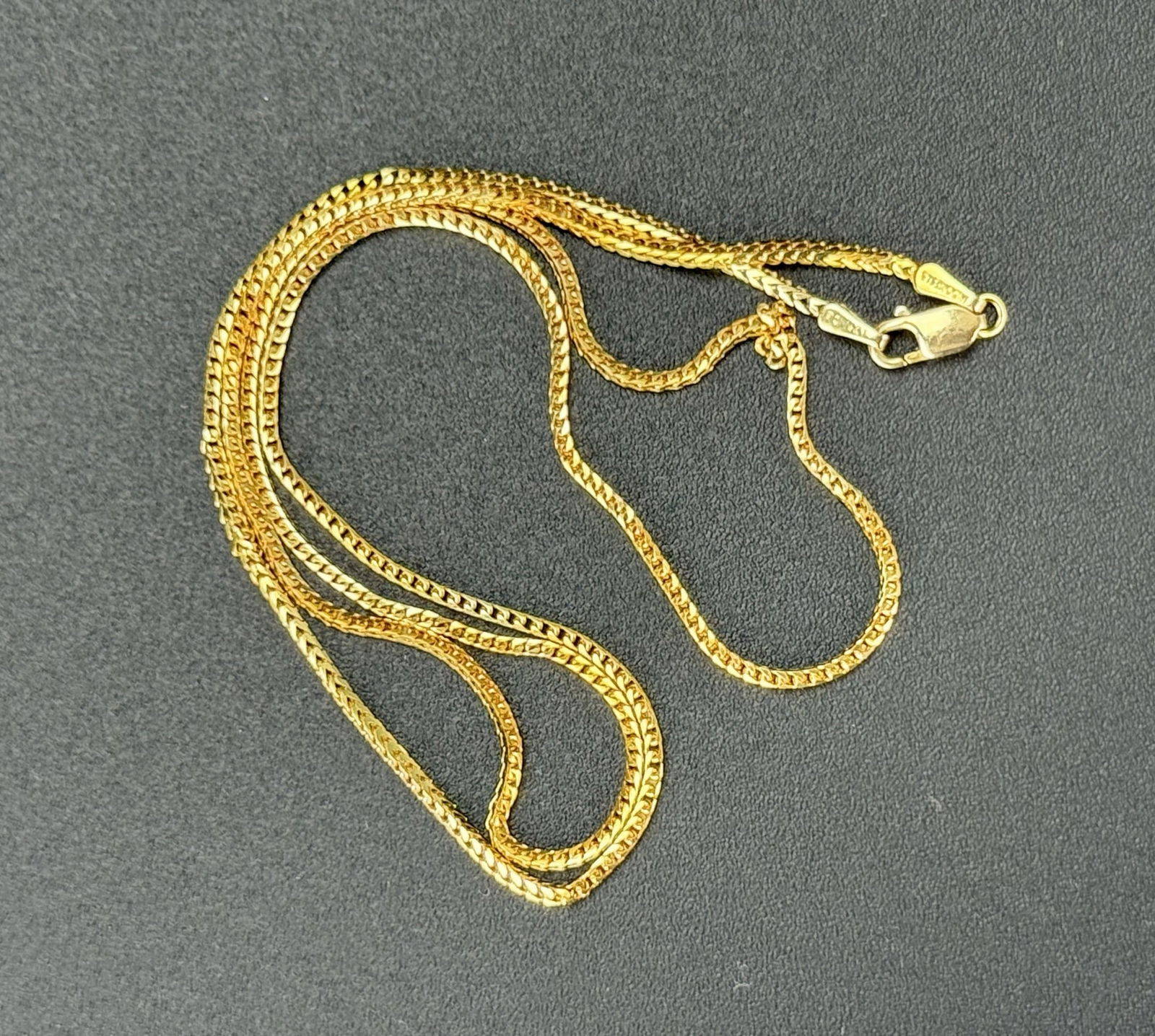 14K Yellow Gold Curb Chain Necklace: 14K Yellow Gold Curb Chain Necklace, Weight 4.6g.The length of the chain, when clasped together, is 23 cm (9 in.). The perimeter of the chain is 46 cm(18 in.).Preview from Oct 21st to 24th from 1:00 P