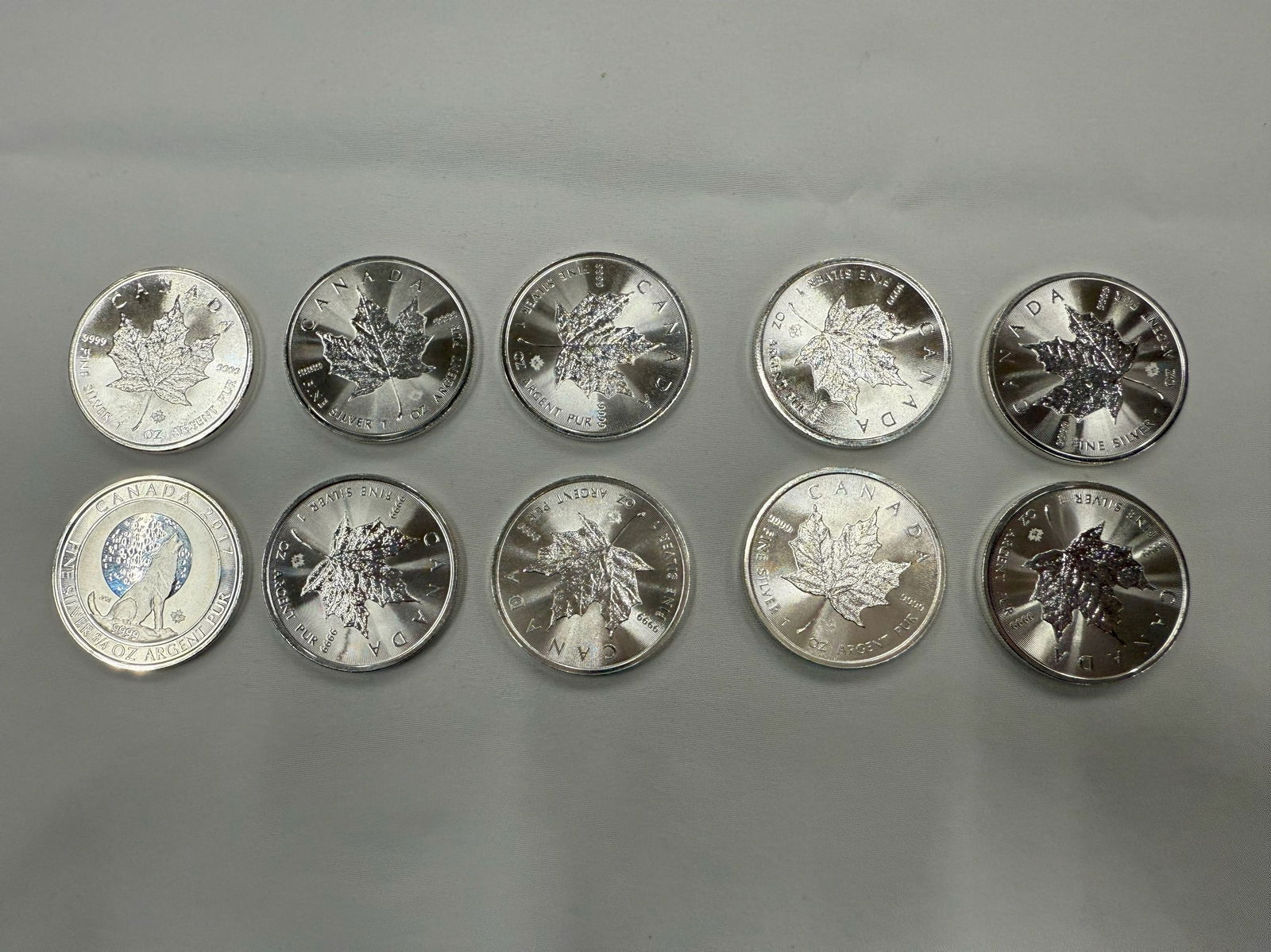 Group of Ten Canada Maple Leaf Coins: Group of Ten Canada Maple Leaf Coins. Preview from Oct .21st to 24th from 1:00 PM TO 5:00 PM Eastern Time, Location: 15229 Display Court, Rockville MD 20850.