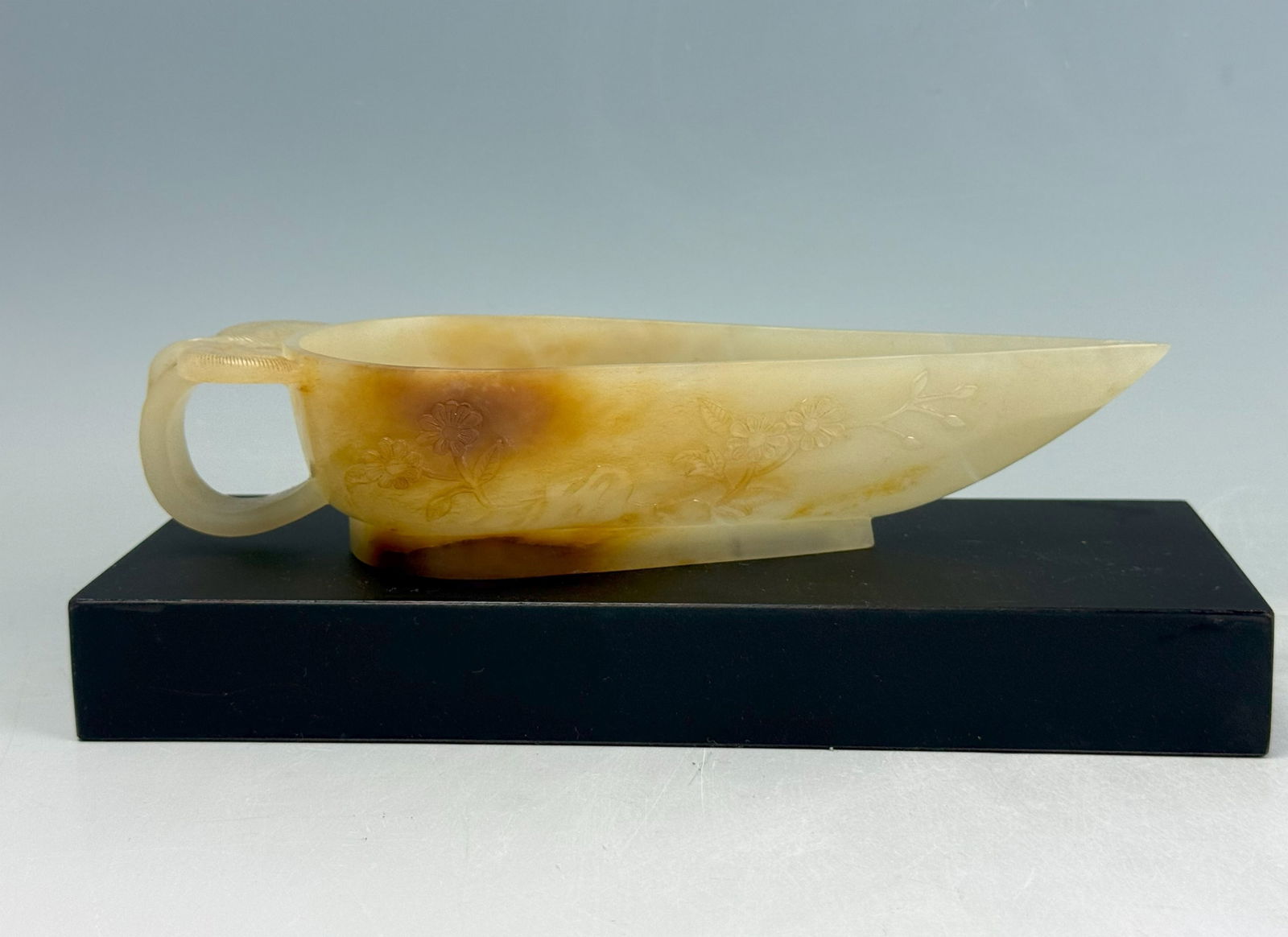A Chinese Carved White Jade Libation Cup (1 of 10)