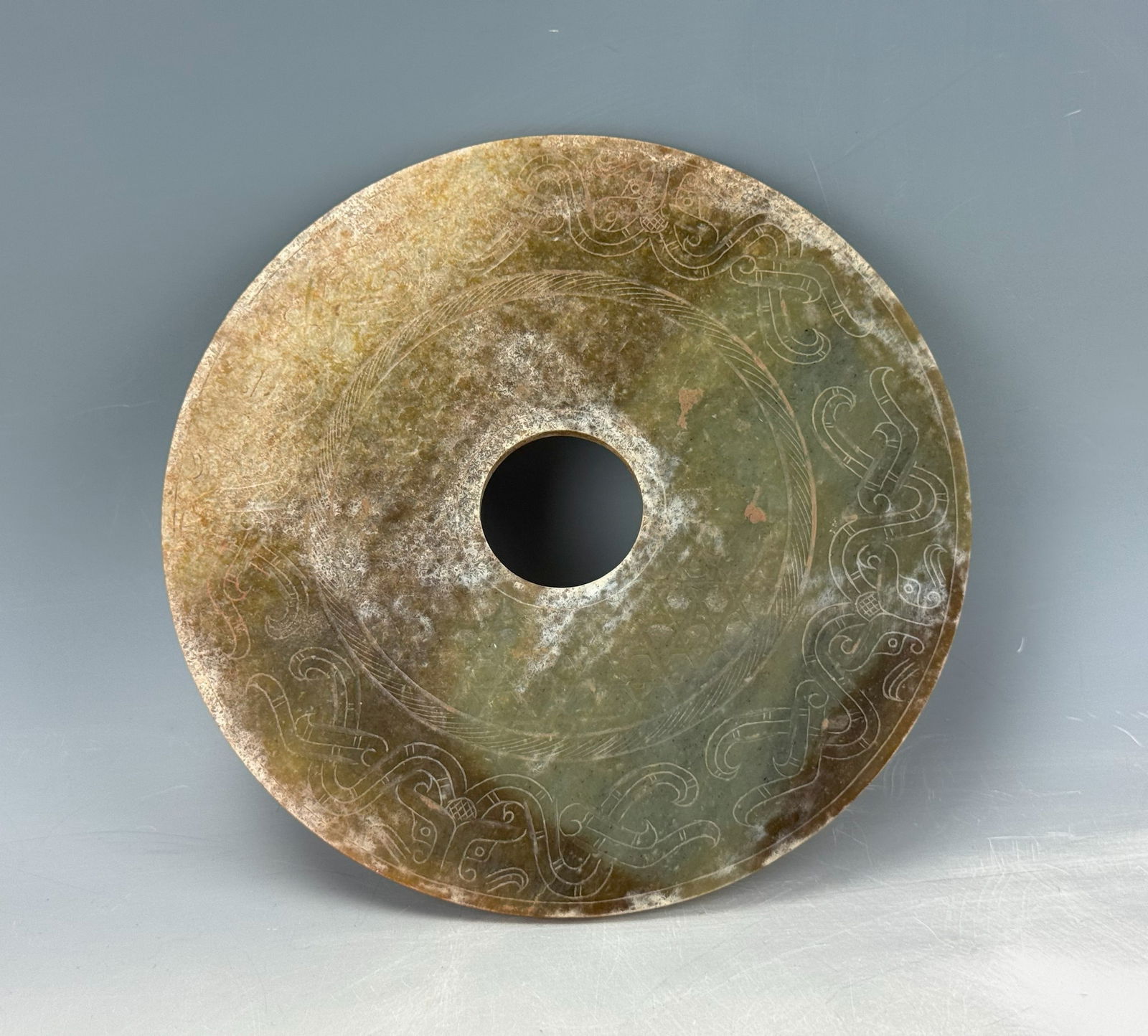 A Chinese Carved Celadon Jade BI Disk (1 of 5)