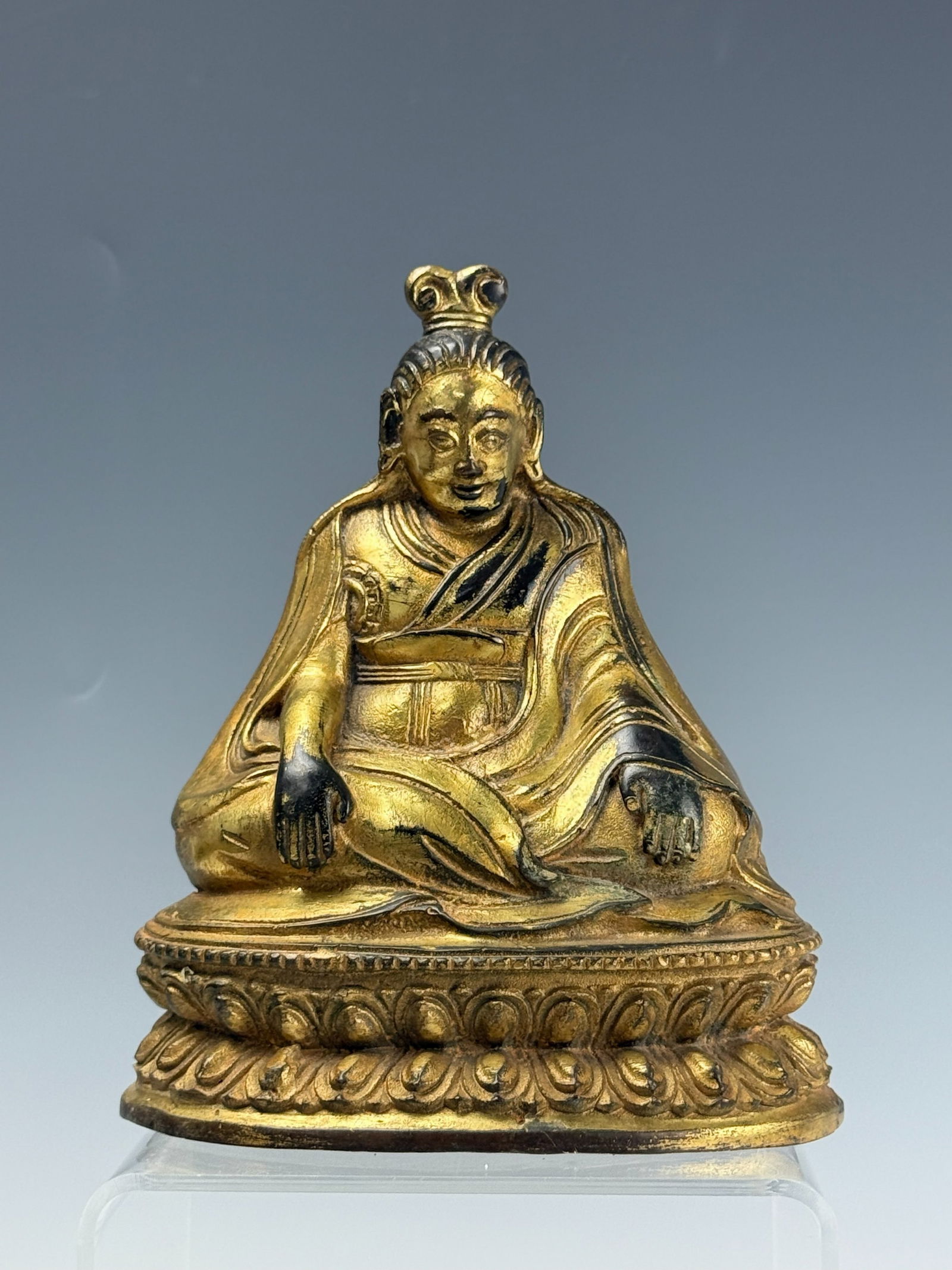 A Gilt Bronze Statue of a Grand Master in Buddhism: Gilt Bronze Statue of a Grand Master in Buddhism, H 17 cm(6.5 in.).Preview from Dec.15th to 19th from 1:00 PM TO 5:00 PM Eastern Time, Location: 15229 Display Court, Rockville, MD 20850.