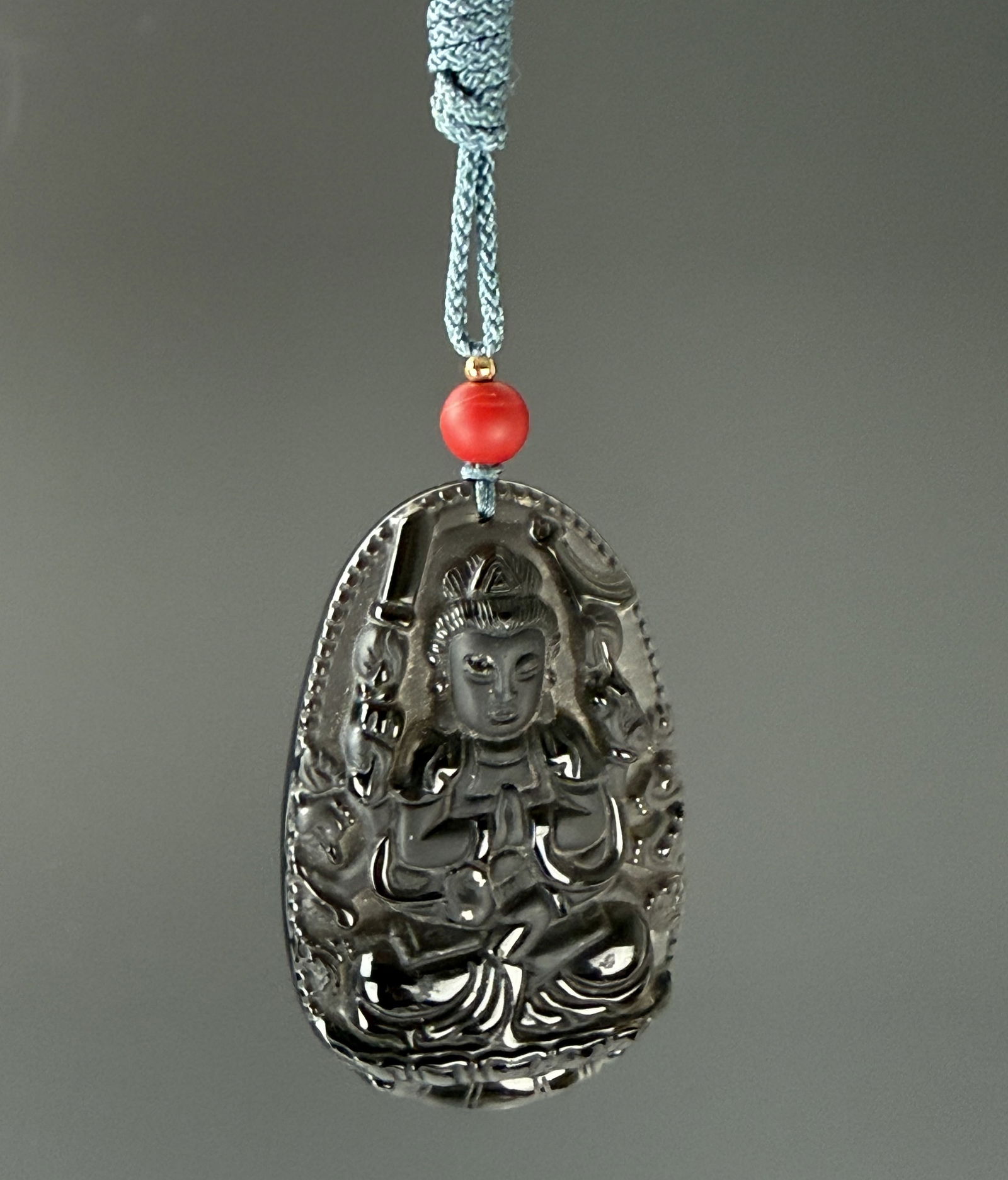 A Chinese Carved Guanyin Buddha Crystal Glass Pendant: A Chinese Carved Guanyin Buddha Crystal Glass Pendant, size 6 x 4 cm,Preview from Dec.15th to 19th from 1:00 PM TO 5:00 PM Eastern Time, Location: 15229 Display Court, Rockville, MD 20850.