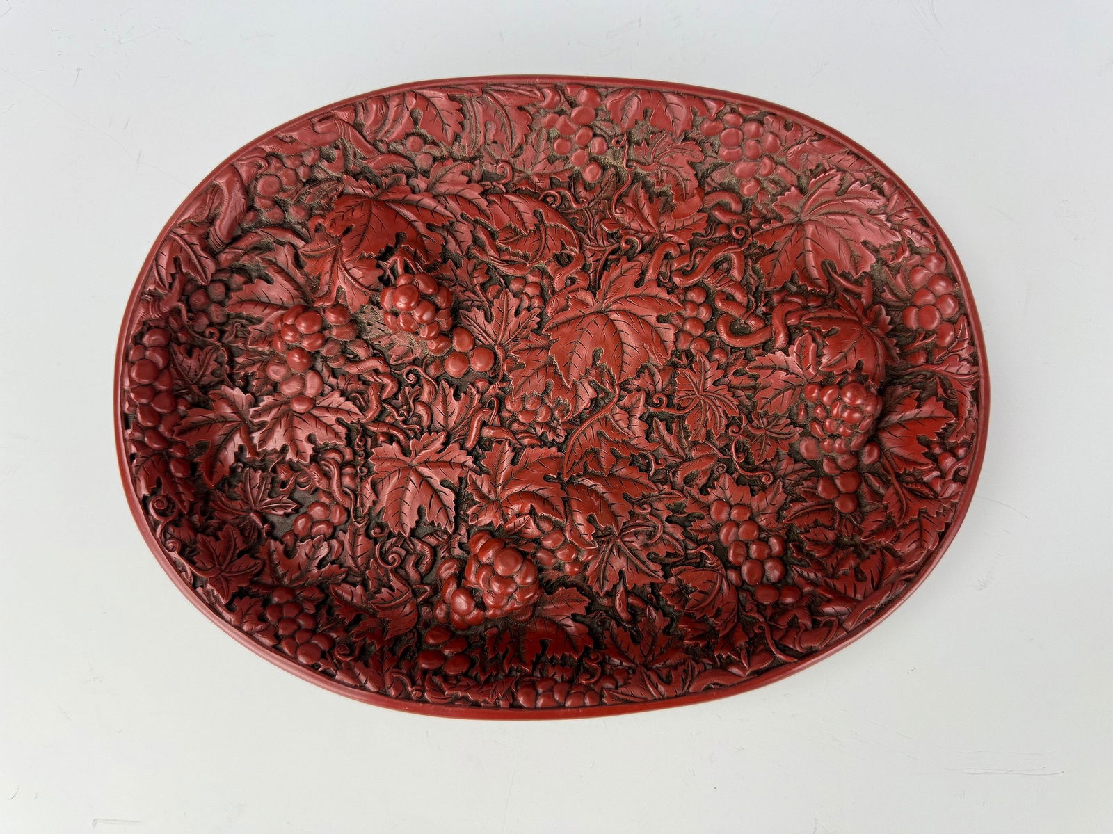 A Chinese Red Cinnabar Lacquer Oval Plate (1 of 5)