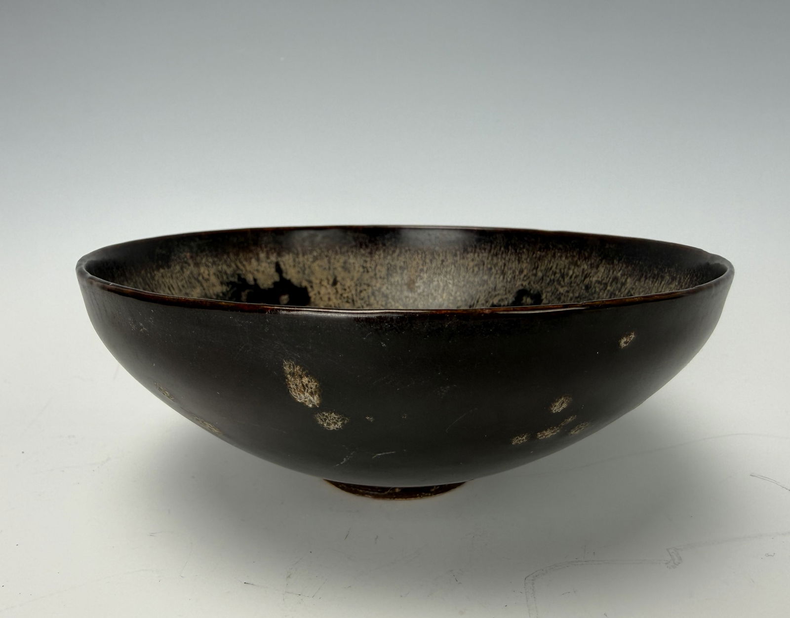 A Chinese Decorated Papercut Decorated Jizhou Bowl (1 of 5)