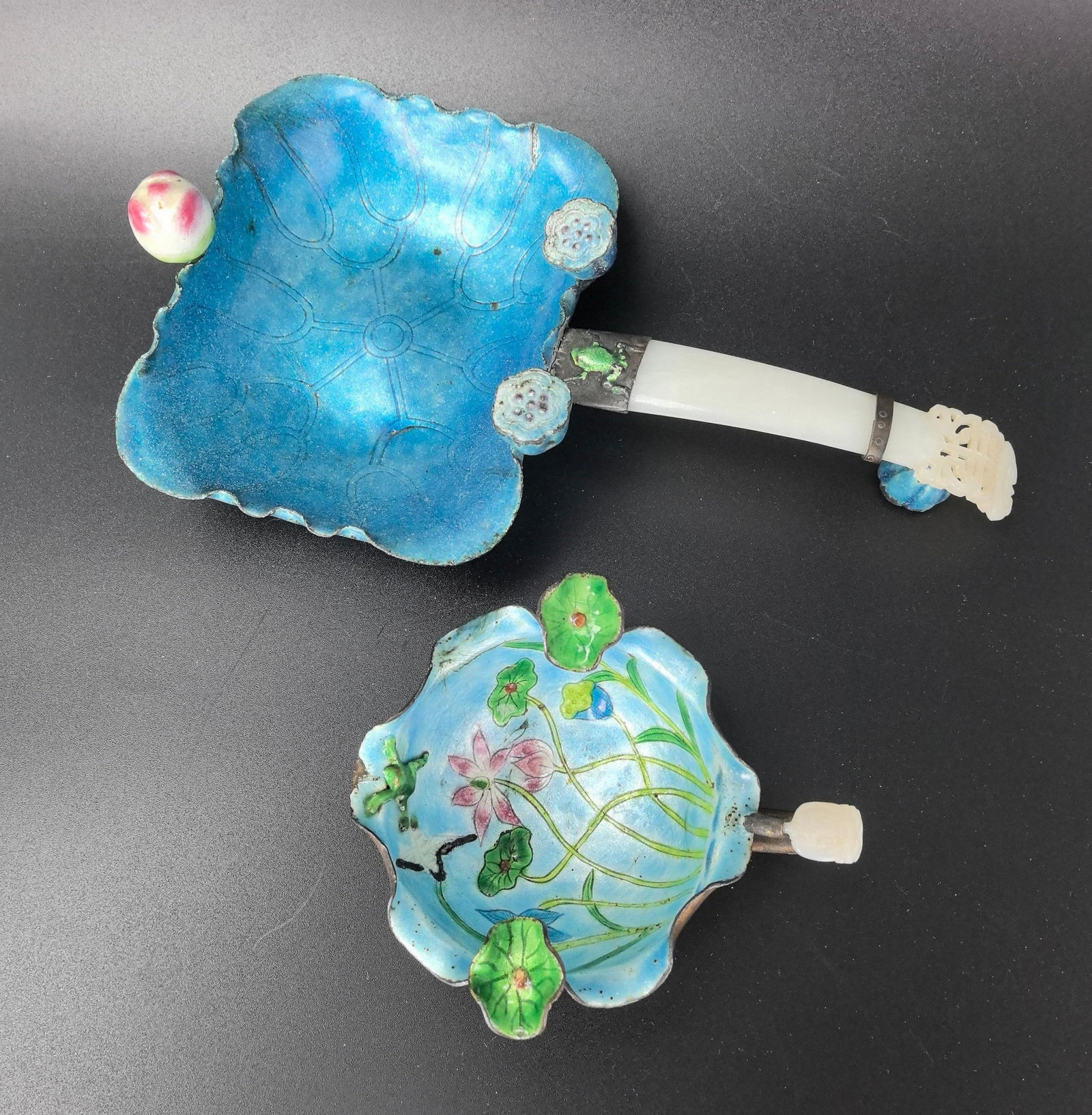 Two Chinese Hetian White Jade Hair Pin Handle Enamel Wine Cups: Two Chinese Hetian White Jade Hair Pin Handle Enamel Wine Cups, W 19 cm(7.5 in.).Preview from Feb 23rd to 27th from 1:00 PM TO 5:00 PM Eastern Time, Location: 15229 Display Court, Rockville, MD 20850.
