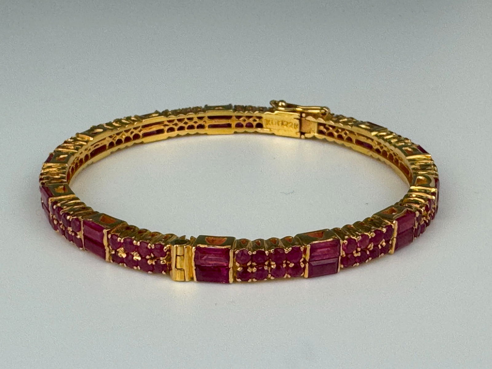 A Vintage 22K Yellow Gold Ruby Bracelet Art Deco: A Vintage 22K Yellow Gold Ruby Bracelet Art Deco, weight 26 gram,L 18.4 cm(7.3 in.).Preview from Feb 23rd to 27th from 1:00 PM TO 5:00 PM Eastern Time, Location: 15229 Display Court, Rockville, MD 208
