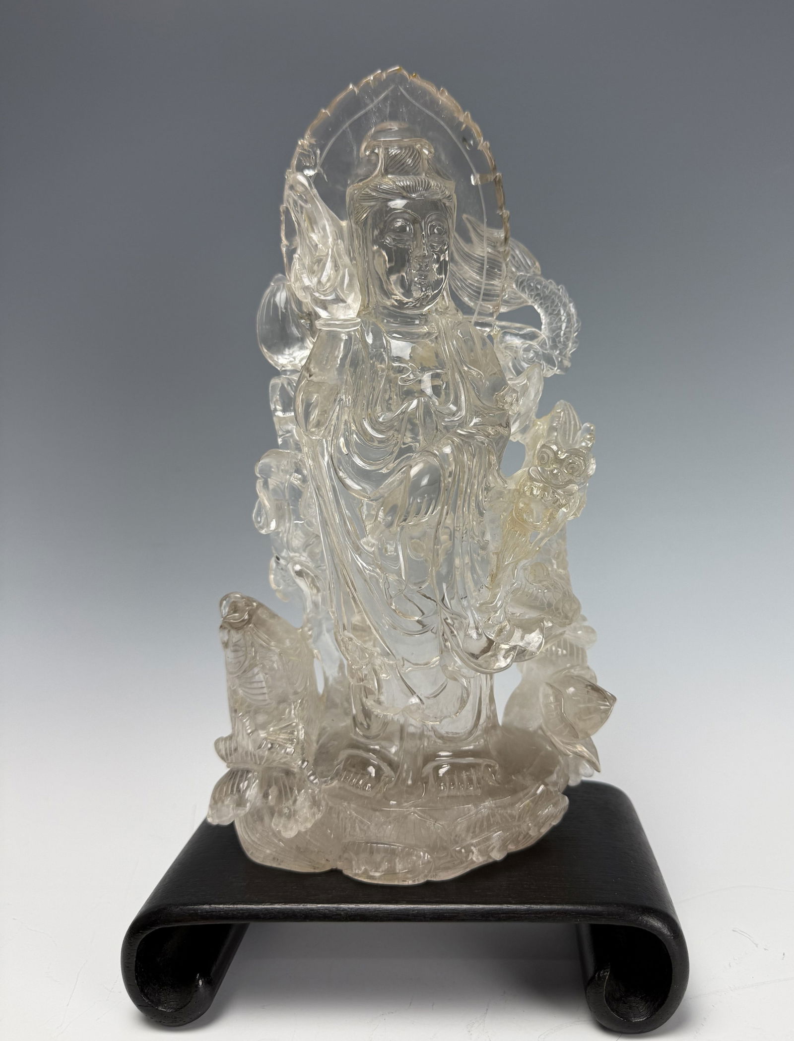 A Chinese Carved Crystal Guanyin Buddha Statue: A Chinese Carved Crystal Guanyin Buddha Statue,H 26 cm(10 in.).Preview from Feb 23rd to 27th from 1:00 PM TO 5:00 PM Eastern Time, Location: 15229 Display Court, Rockville, MD 20850.