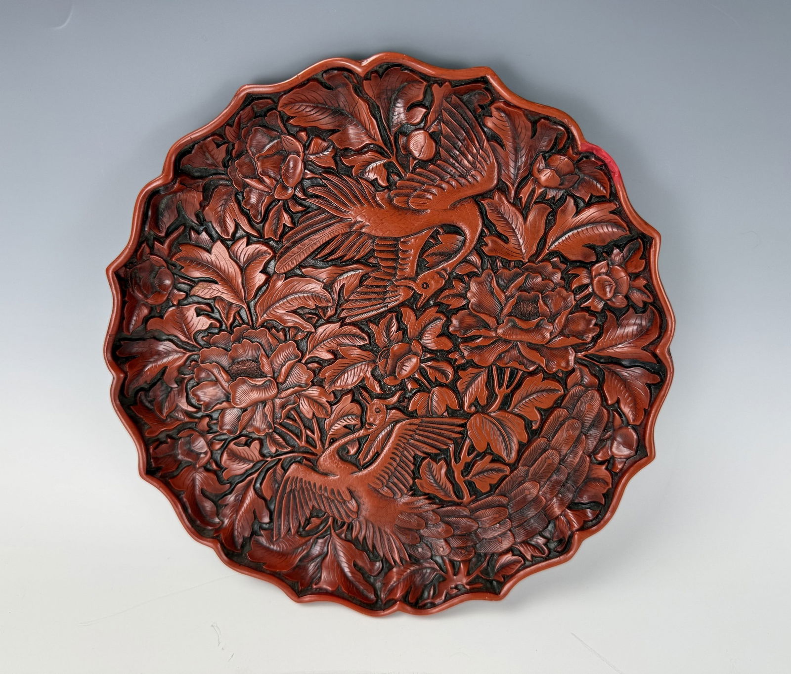 A Chinese Red Cinnabar Carved Plate (1 of 3)