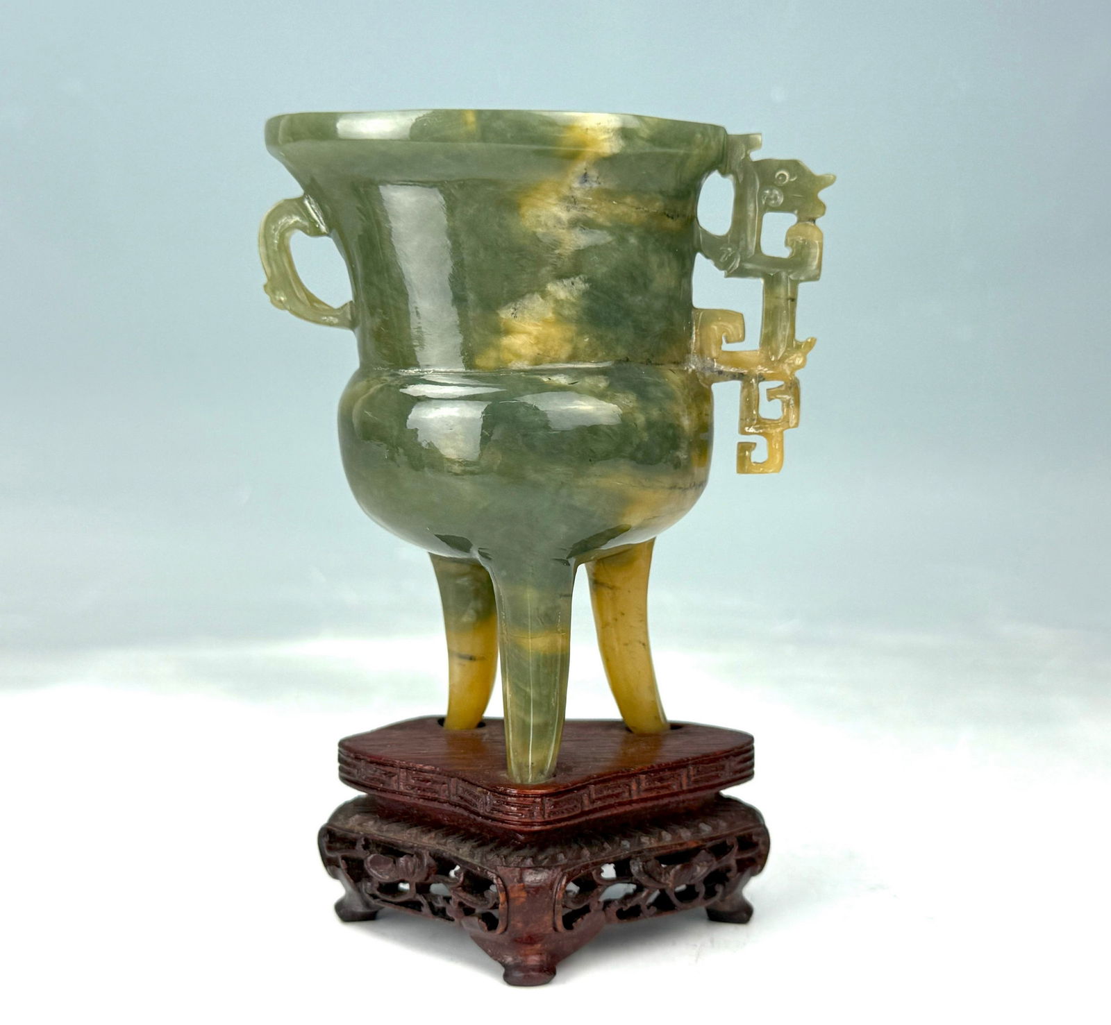 A Chinese Celadon Jade Carved Tripod Cup Imitating Bronze Wine Vessel Jia,with wood stand, H 9.5 cm (1 of 6)