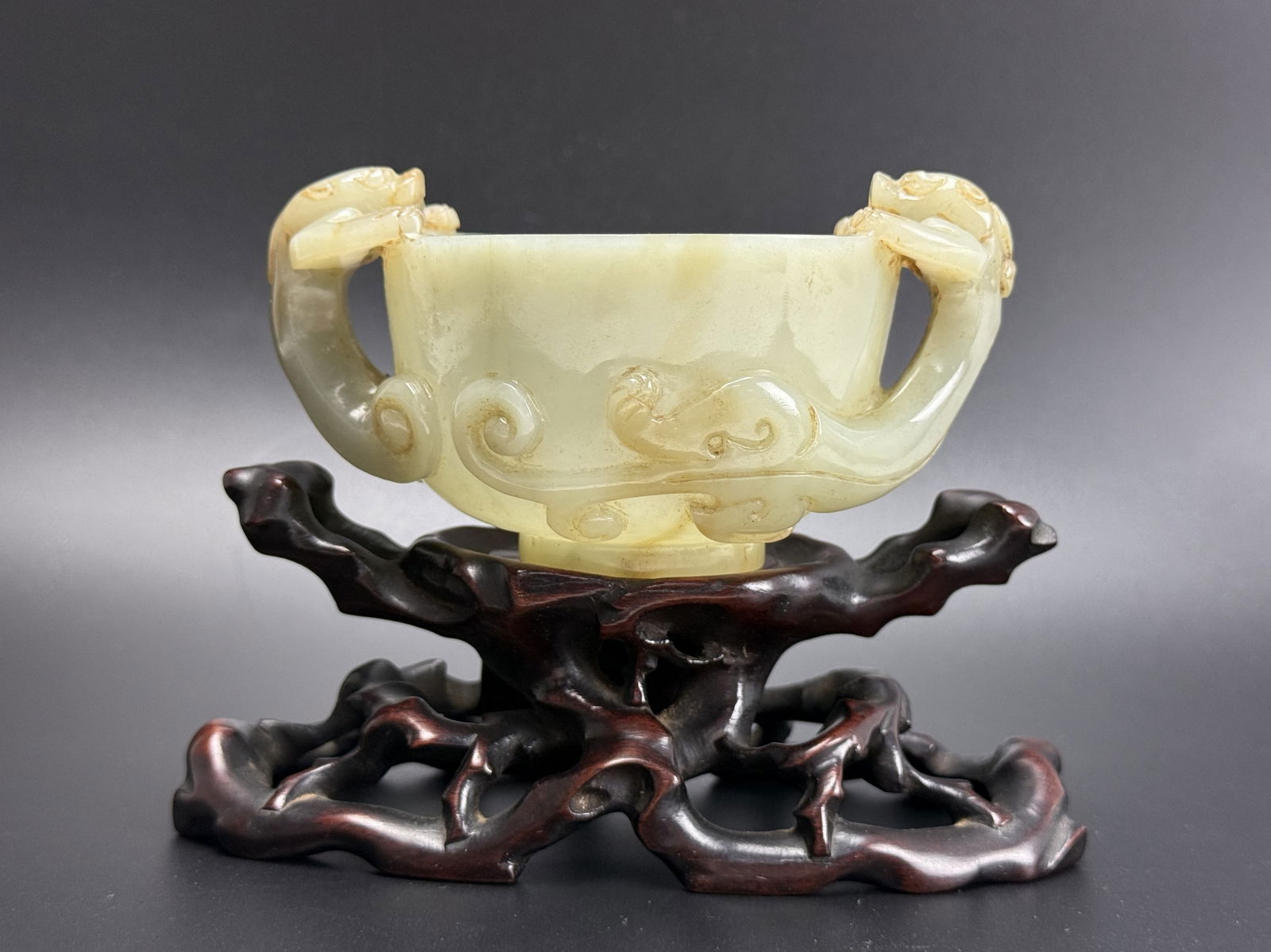A Chinese Carved Dragon Celadon Jade Cup with Wood Stand, size 11.5 x 8 x 5.2 cm,Preview from Feb (1 of 7)