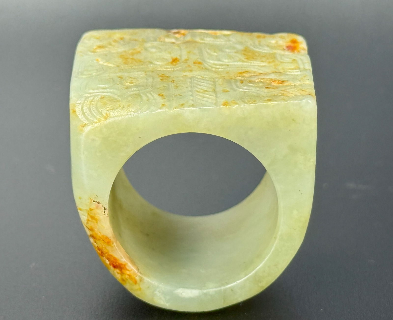 Chinese Carved Taotie Masks Jade Archers Ring,size 3 x 2.5 cm.Preview from Feb 23rd to 27th from: Chinese Carved Taotie Masks Jade Archers Ring,size 3 x 2.5 cm.Preview from Feb 23rd to 27th from 1:00 PM TO 5:00 PM Eastern Time, Location: 15229 Display Court, Rockville, MD 20850.