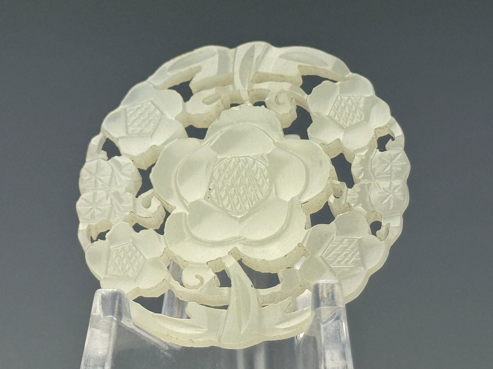 Chinese Carved Flower White Jade Pendant: Chinese Carved Flower White Jade Pendant,D 4.3 CM.Preview from Feb 23rd to 27th from 1:00 PM TO 5:00 PM Eastern Time, Location: 15229 Display Court, Rockville, MD 20850.