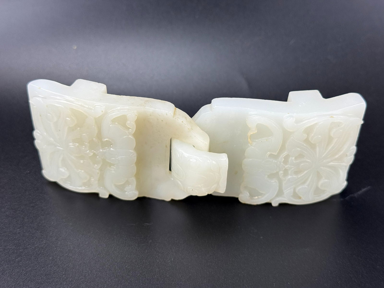 Chinese Carved White Jade Two Part Belt Buckle: Chinese carved white jade two-part belt buckle,size 13 x 5 x 1.5 cmPreview from Feb 23rd to 27th from 1:00 PM TO 5:00 PM Eastern Time, Location: 15229 Display Court, Rockville, MD 20850.