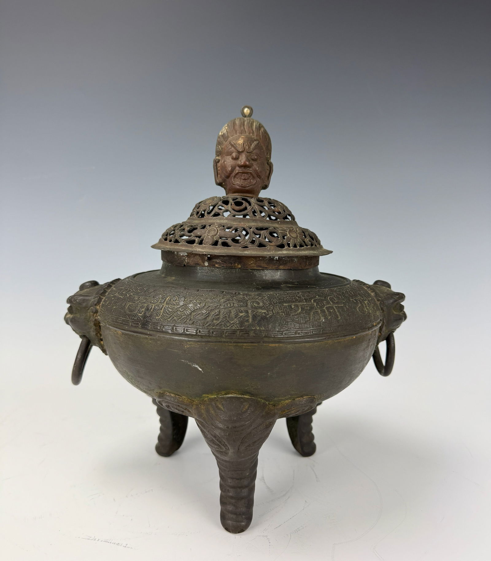 A Chinese Bronze Covered Tripod Censer (1 of 9)