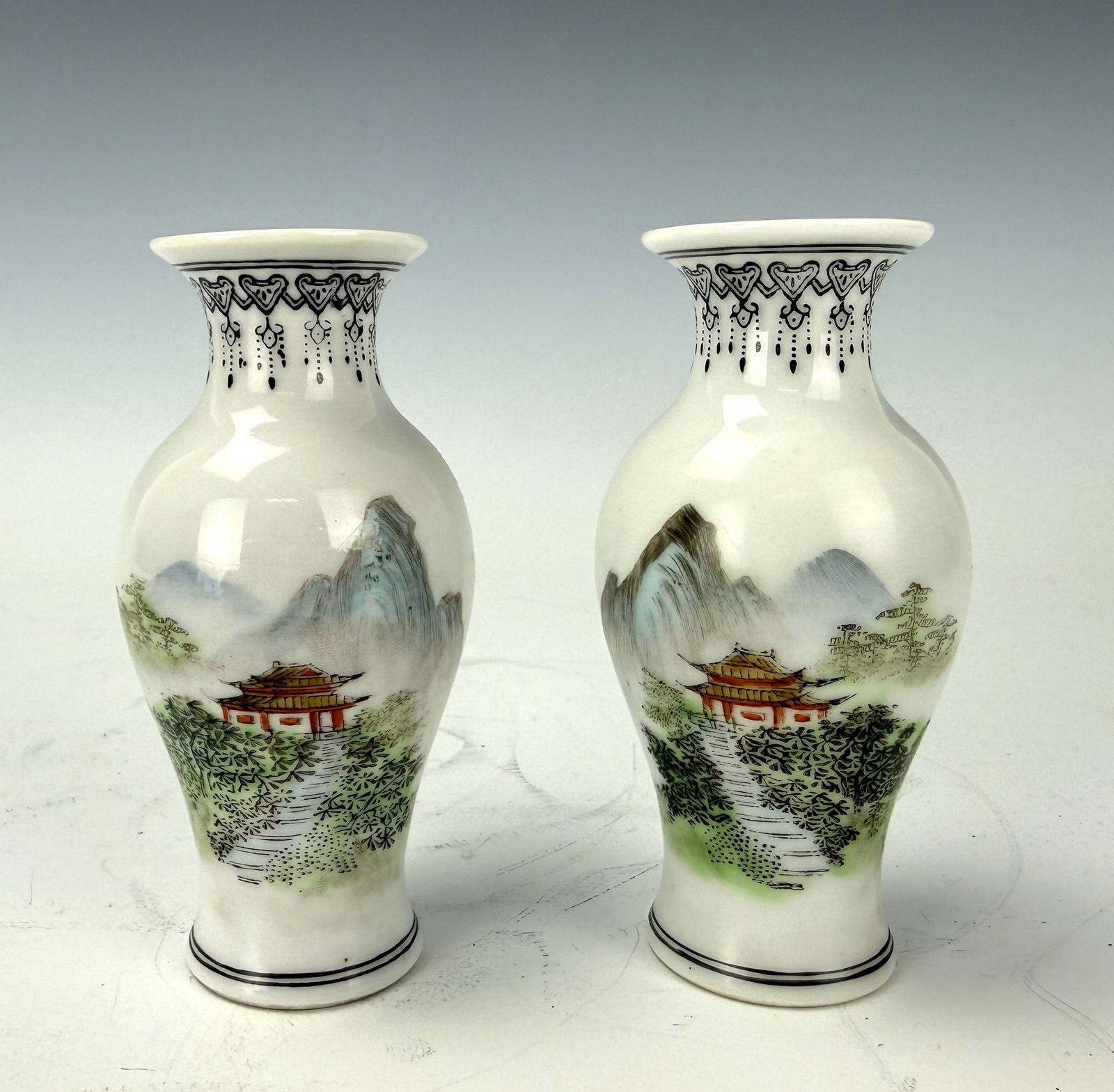 A Pair of Famille Rose Porcelain Vases Jingdezhen Mark: A Pair of Famille Rose Porcelain Vases Jingdezhen Mark,H 10.2 cm(4 in.) x2.Preview from Feb 23rd to 27th from 1:00 PM TO 5:00 PM Eastern Time, Location: 15229 Display Court, Rockville, MD 20850.