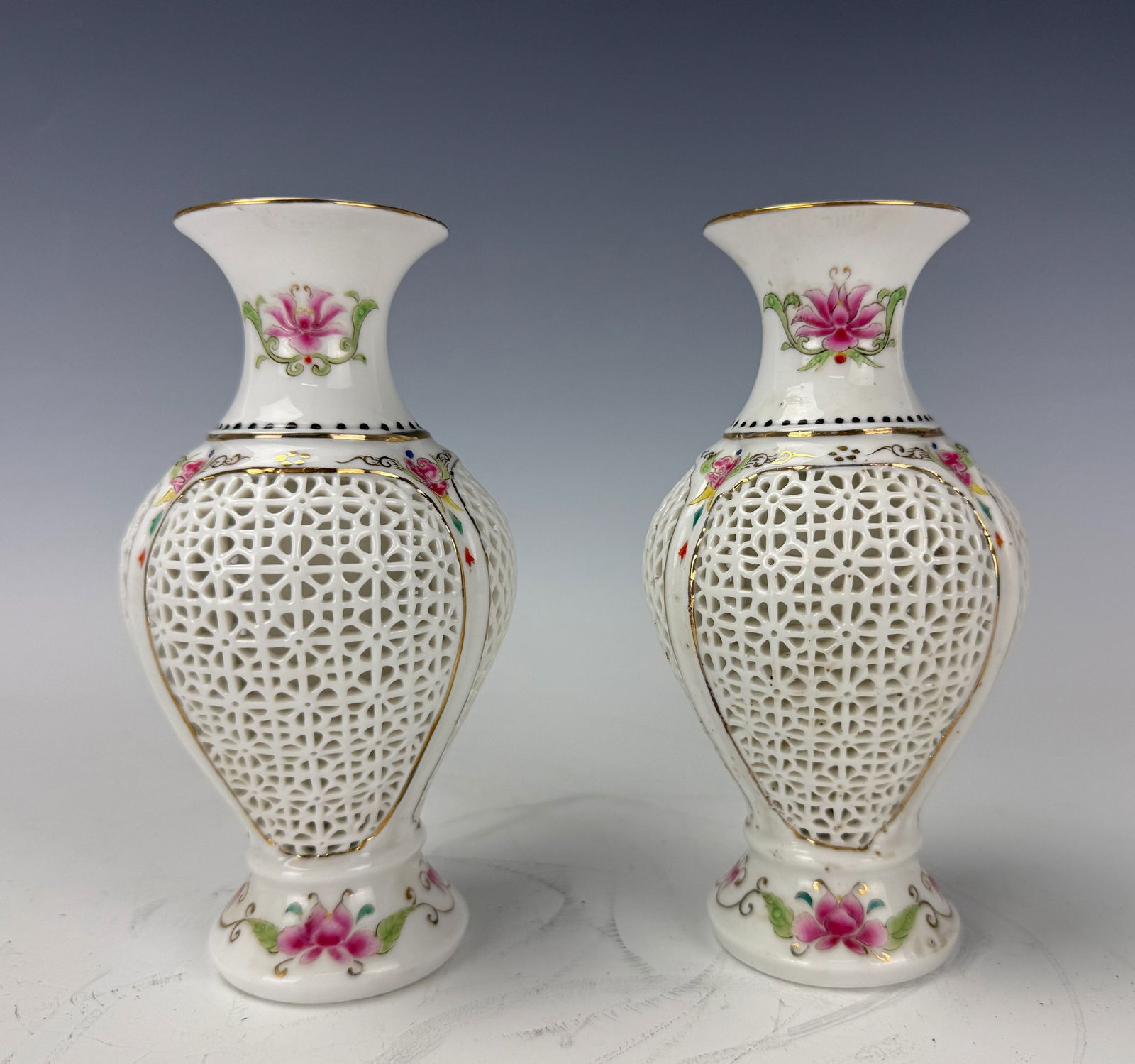 Pair of Vintage Chinese Reticulated Porcelain Vases: Pair of Vintage Chinese Reticulated Porcelain Vases, H 15 cm. (5.7 in.)x 2.Preview from Feb 23rd to 27th from 1:00 PM TO 5:00 PM Eastern Time, Location: 15229 Display Court, Rockville, MD 20850.