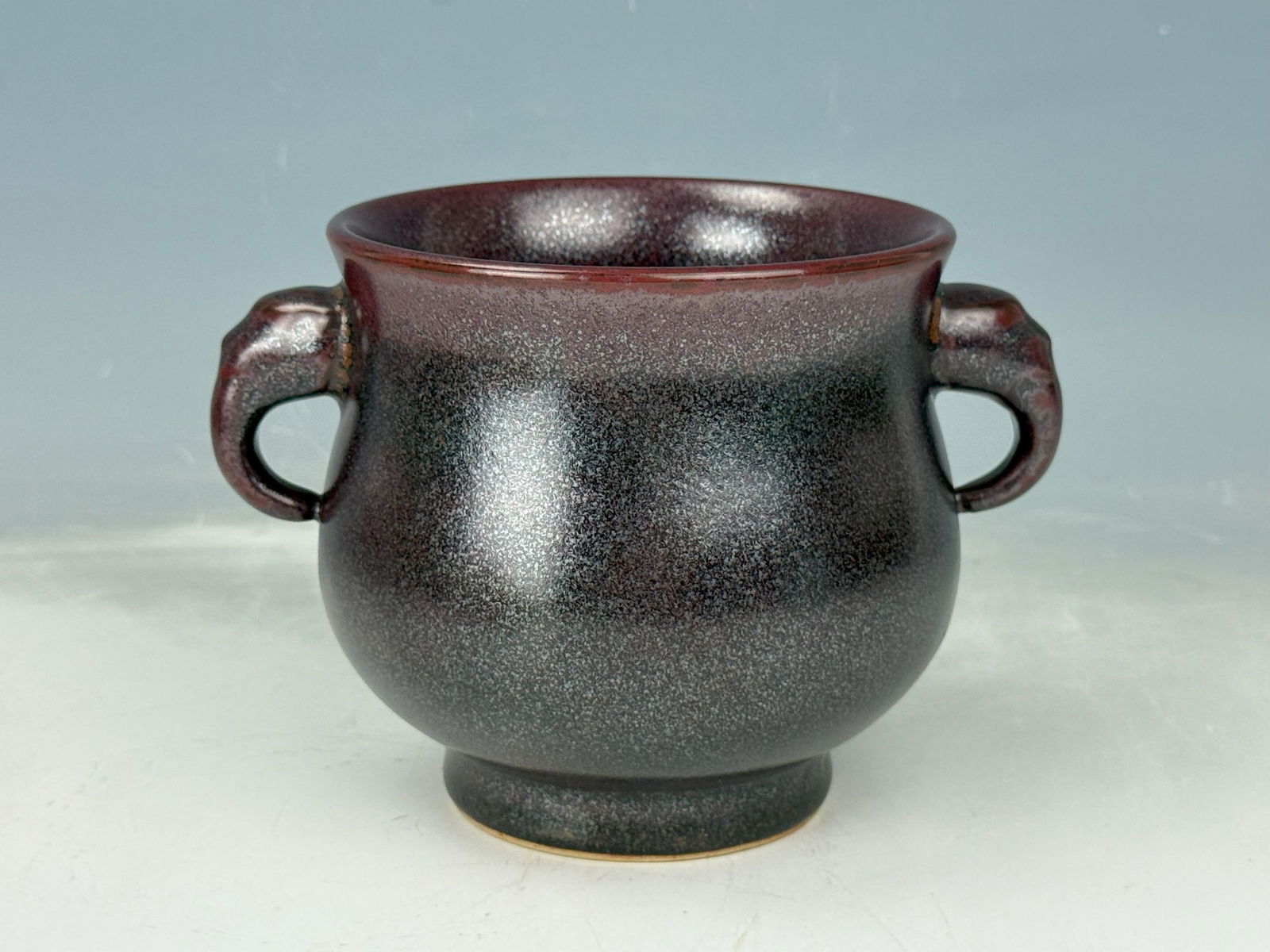 Chinese Iron Rust Red Porcelain Incense Burner with Double Handles: A Chinese Iron Rust Red Porcelain Incense Burner with Double Ears of Rlephant Heads,Kangxi Mark, D 15 cm(6 in.) x H 10 cm(4 in.)..Preview from Feb 23rd to 27th from 1:00 PM TO 5:00 PM Eastern Time, Lo