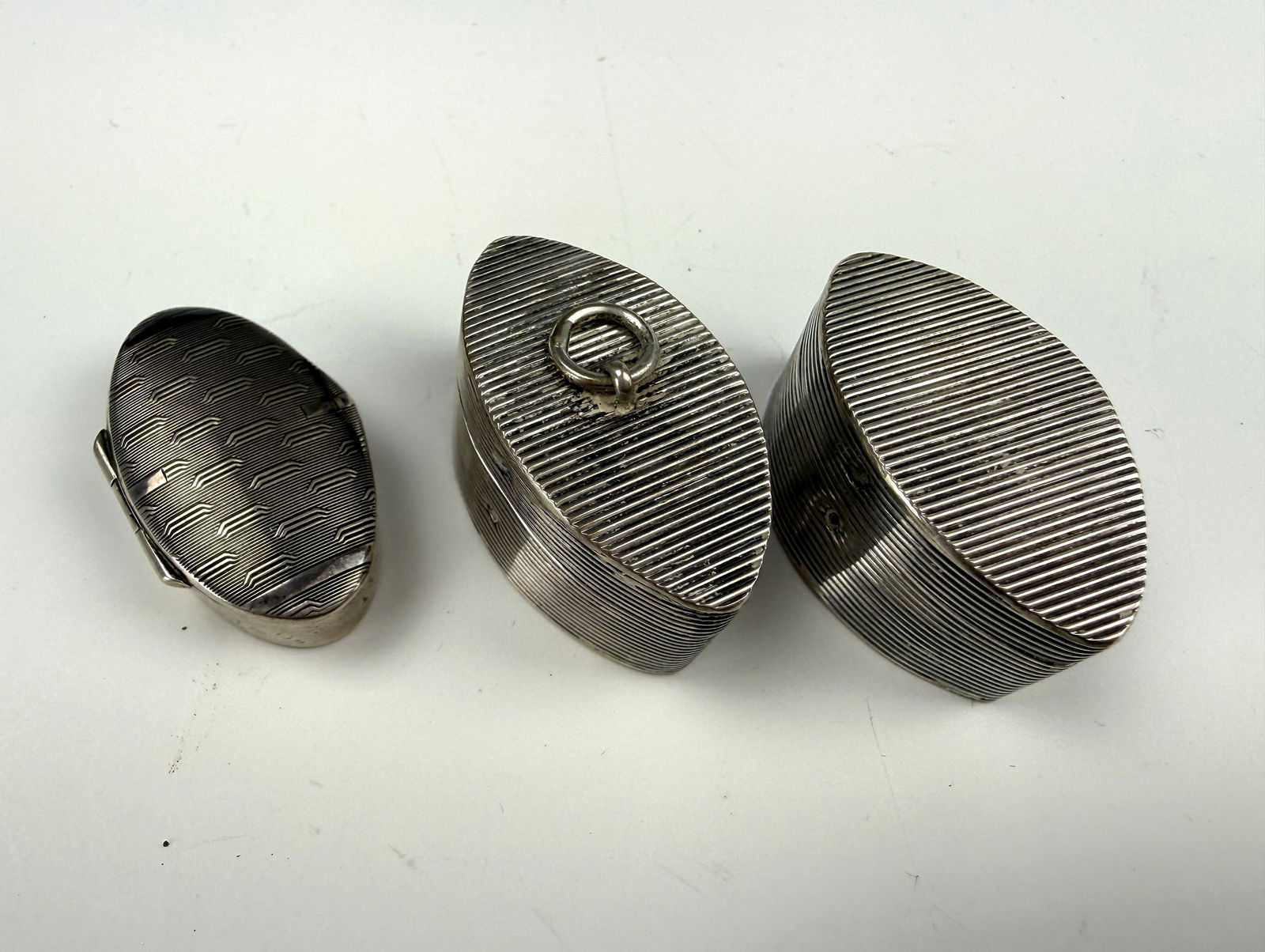 Three Vintage Silver Novelty Box or Pill Box: Three Vintage Silver Novelty Box or Pill Box,total weight 32 g, each size 3.6 x 2 x 2 cm.Preview from Apr 20th to 24th from 1:00 PM TO 5:00 PM Eastern Time, Location: 15229 Display Court, Rockville, M