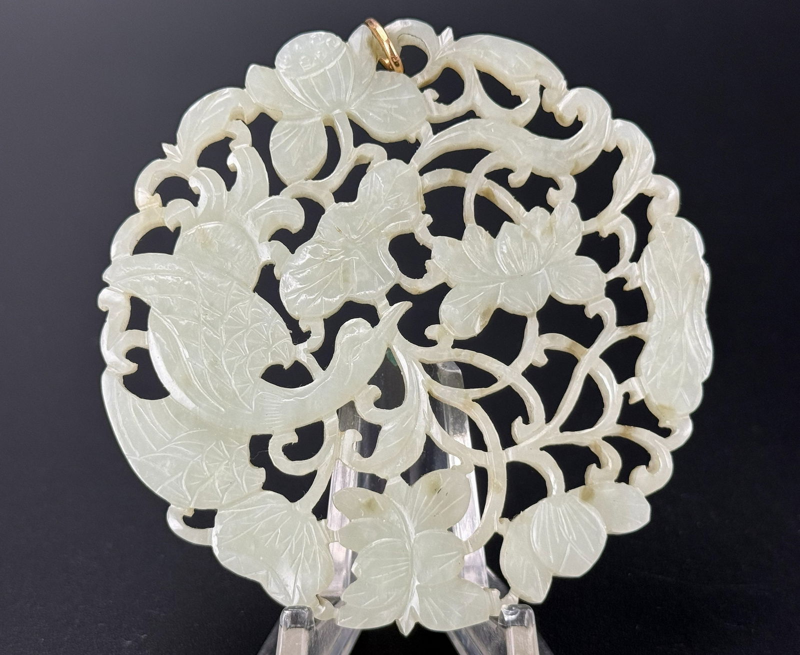 A Chinese Caved Jade Pendant: A Chinese Caved Jade Pendant ,D 7.3 cm(3 in.).Preview from Apr 20th to 24th from 1:00 PM TO 5:00 PM Eastern Time, Location: 15229 Display Court, Rockville, MD 20850.