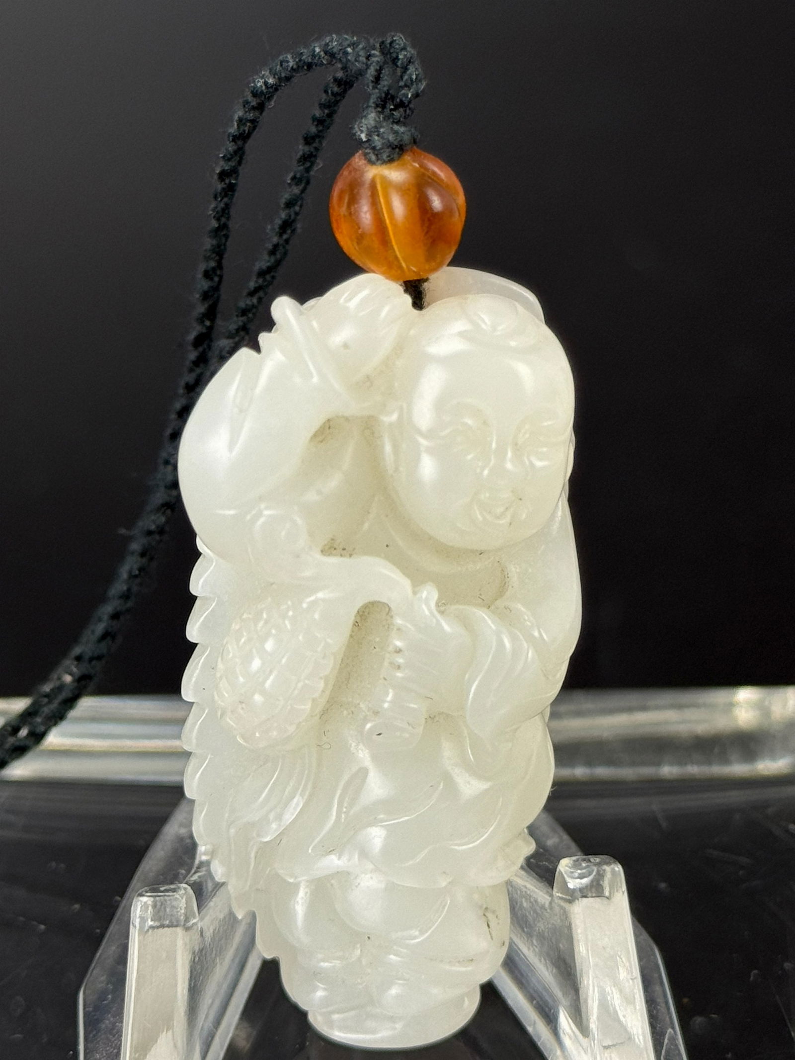 Chinese White Jade Pendant Carved with Figure: Chinese White Jade Pendant Carved with Figure.size 5 x 2.5 x1.4 cm.Preview from Apr 20th to 24th from 1:00 PM TO 5:00 PM Eastern Time, Location: 15229 Display Court, Rockville, MD 20850.