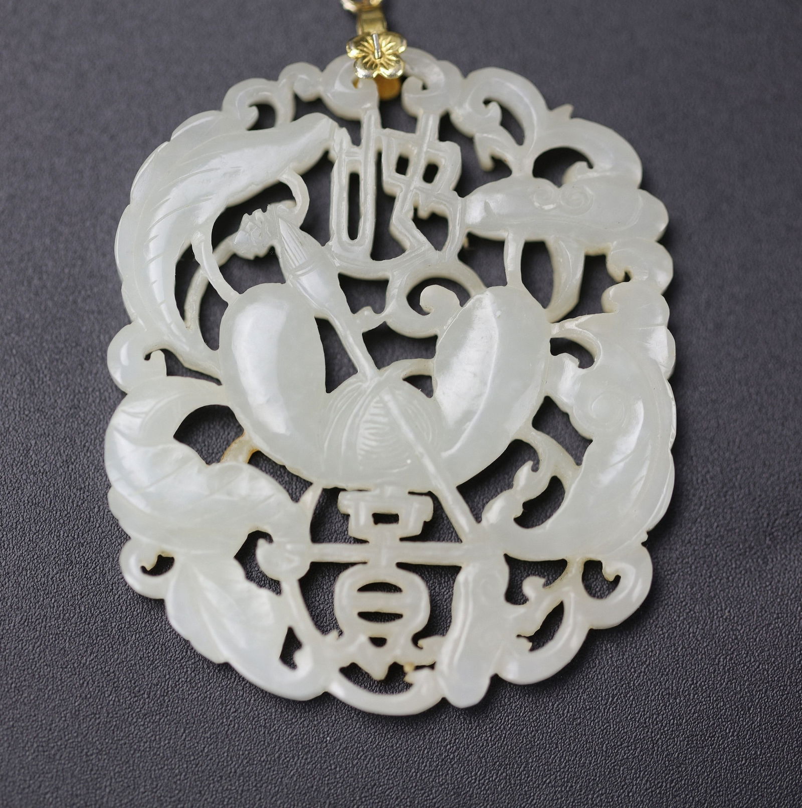 A Chinese Carved Biding Ruyi White Jade Pendant: A Chinese Carved Biding Ruyi White Jade Pendant ,size 6 x 5 cm,Preview from Apr 20th to 24th from 1:00 PM TO 5:00 PM Eastern Time, Location: 15229 Display Court, Rockville, MD 20850.