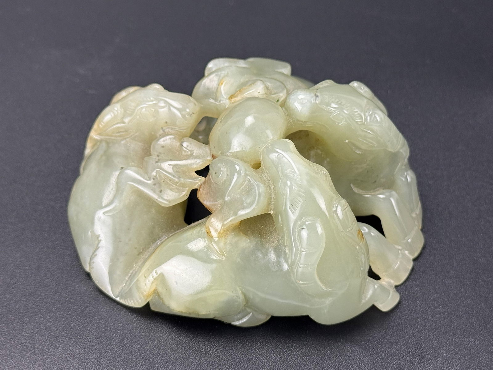Chinese Carved Celadon Jade Three Goats Bringing Prosperity: Chinese Carved Celadon Jade Three Goats Bringing Prosperity,size 8.5 x 7 x 4 cm.Preview from Apr 20th to 24th from 1:00 PM TO 5:00 PM Eastern Time, Location: 15229 Display Court, Rockville, MD 20850.