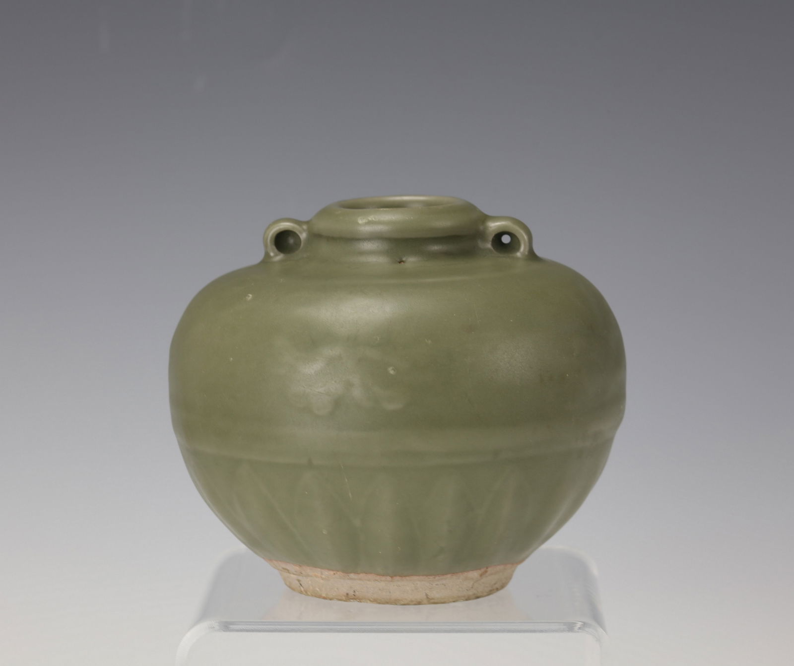 Ming Dynasty Longquan Celadon Jar with Double Loop Holes: Ming Dynasty longquan celadon jar with double loop holes,H 10 cm(4in.) x W 11.8 cm(4.6 in.).Preview from Apr 20th to 24th from 1:00 PM TO 5:00 PM Eastern Time, Location: 15229 Display Court, Rockville