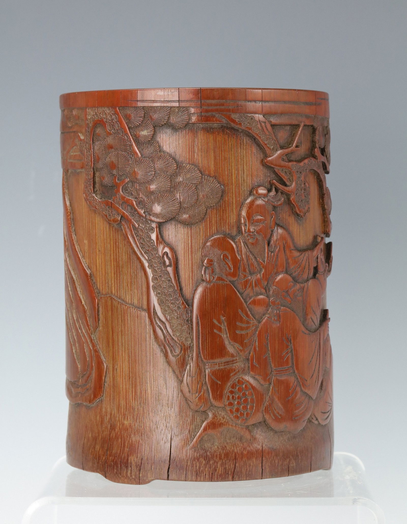 Chinese Bamboo Brush Pot with Low Relief Carving of Three Scholars: Bamboo brush pot with low relief carving of three scholars, H 15.6cm(6 in.) x W 11 cm(4.5 in.).Preview from Apr 20th to 24th from 1:00 PM TO 5:00 PM Eastern Time, Location: 15229 Display Court, Rockvi