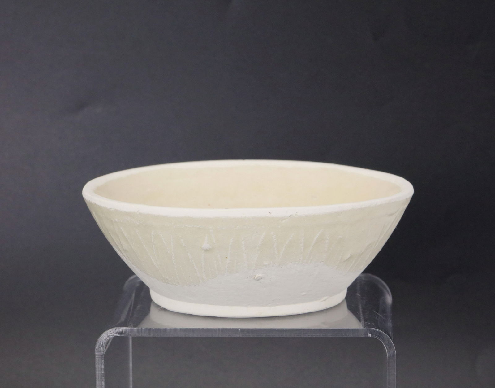 Chinese Yuan Danasty White Glazed Marco Polo Bowl: White glazed Marco Polo bowl (Yuan Dynasty),D 12.6cm ( 4.7 in.) x H 4.2 cm (1.7 in.).Preview from Apr 20th to 24th from 1:00 PM TO 5:00 PM Eastern Time, Location: 15229 Display Court, Rockville, MD 20