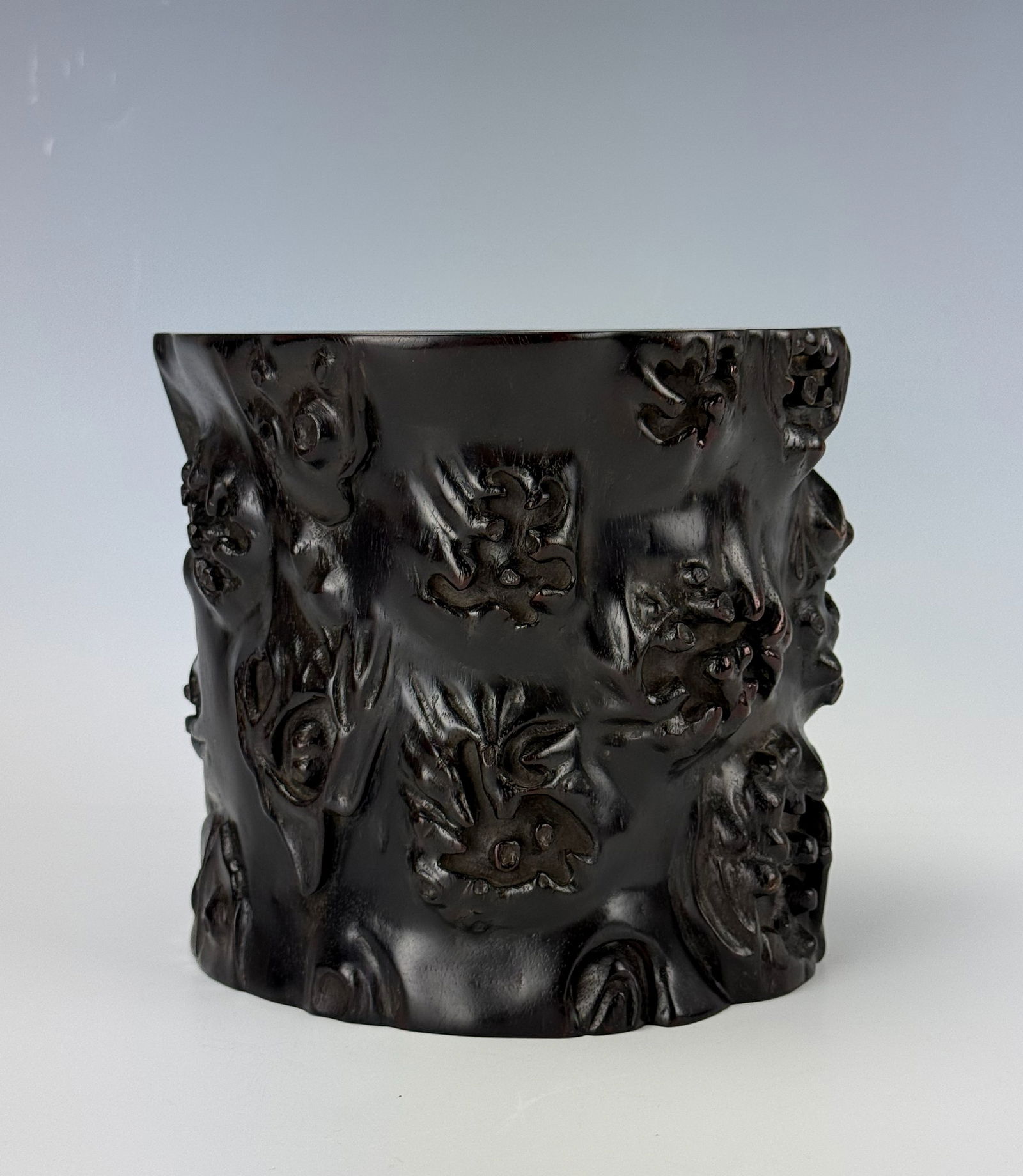 A Large Chinese Carved Hardwood Brush Pot: Large hardwood brush pot carved in the shape of a pine trunk, H 16.5 cm (6.5 in) x D 16.8cm (6.6 in). Preview from Apr 20th to 24th from 1:00 PM TO 5:00 PM Eastern Time, Location: 15229 Display Court,