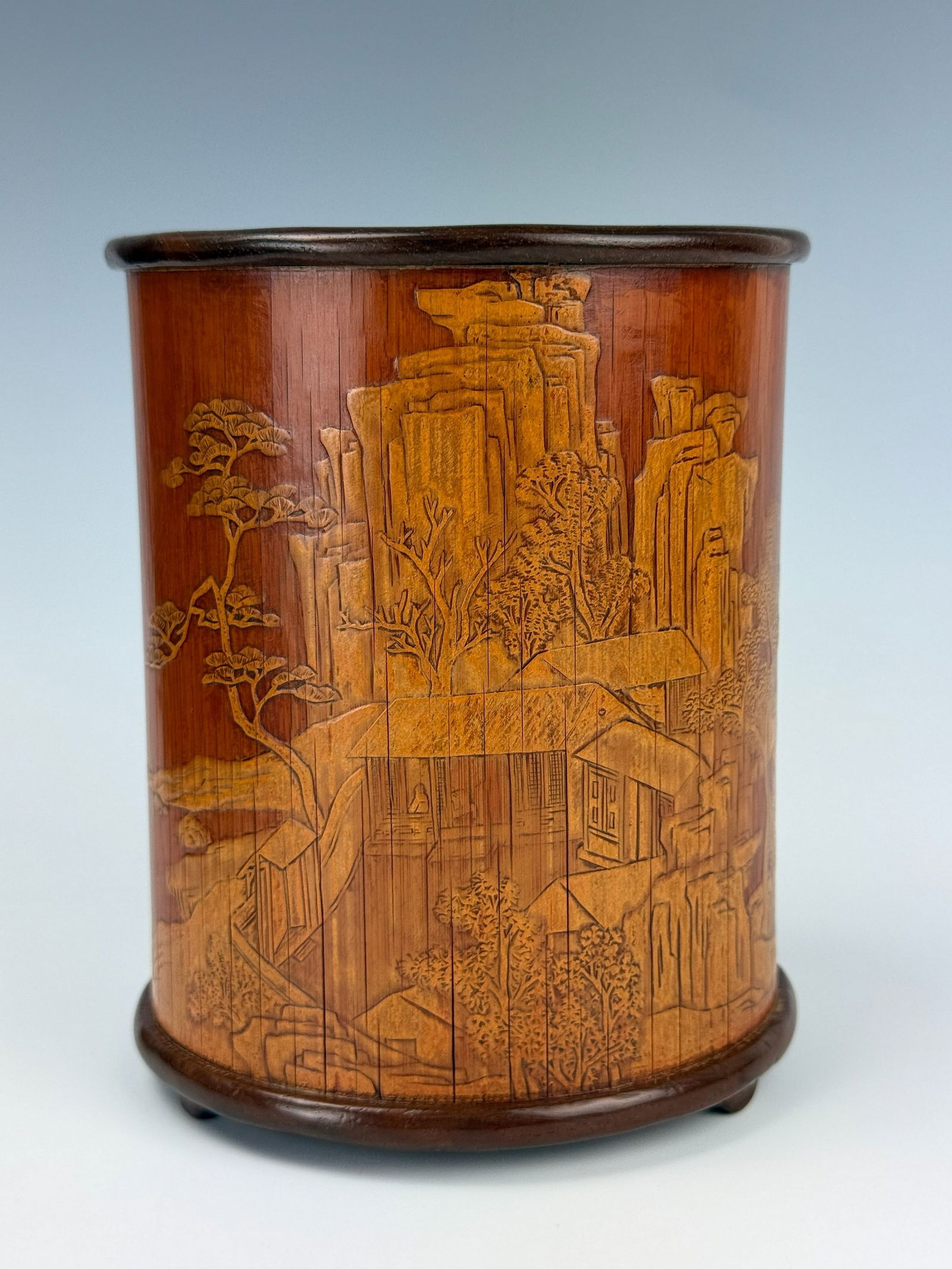 Bamboo Brush Pot with Low Relief Carving of Landscape: Bamboo Brush pot with low relief carving of landscape, H 15.2cm (6in) x D12.1 cm (4.8in). Preview from Apr 20th to 24th from 1:00 PM TO 5:00 PM Eastern Time, Location: 15229 Display Court, Rockville,