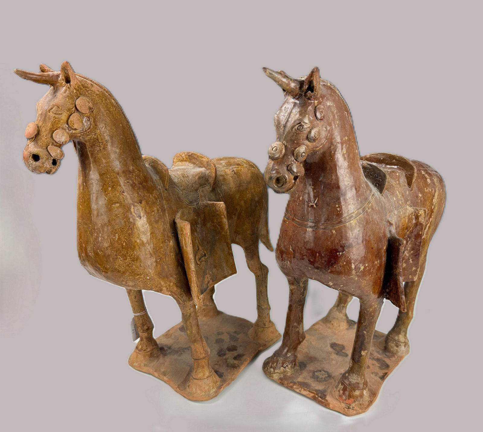 Two Ancient Chinese Brown Glazed Pottery Horses: Two Ancient Chinese Brown Glazed Pottery Horses,size H 47 cm (18 in) x W 43 cm (17 in) x D 18 cm (7 in). Provenance from Dr. Constantine collection, Acquired directly from TK Asian Antiquities.Preview