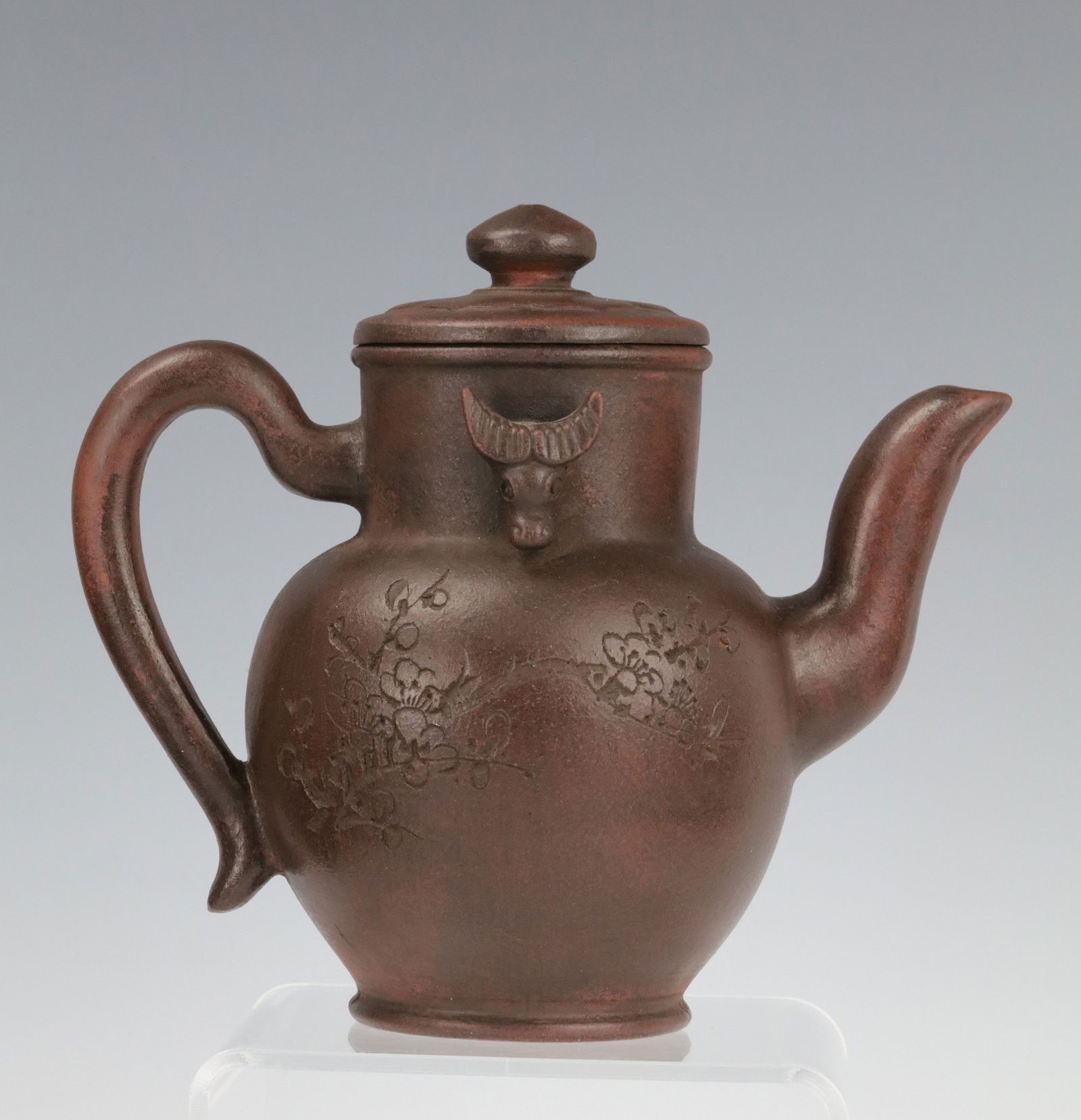 Yixing Zisha Teapot with Double Ox Heads and Lotus Lid: Yixing Zisha tea pot with double ox heads with lid decorared with lotus flowers, H 14 cm (5.5in) x W 16.5 cm(6.5in ). Preview from Apr 20th to 24th from 1:00 PM TO 5:00 PM Eastern Time, Location: 1522