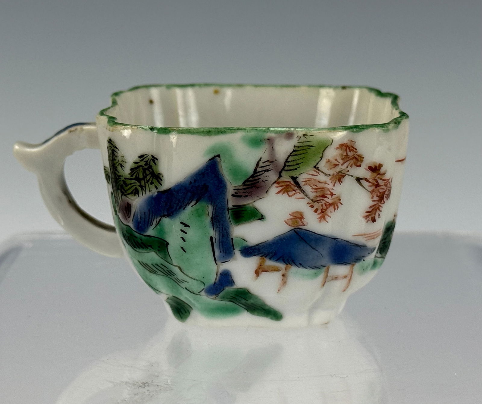 A Chinese Famille Verte Porcelain Small Cup: A Chinese Famille Verte Porcelain Small Cup, size 6.5 x 4.5 x 4.5 cm .Preview from Apr 20th to 24th from 1:00 PM TO 5:00 PM Eastern Time, Location: 15229 Display Court, Rockville, MD 20850.