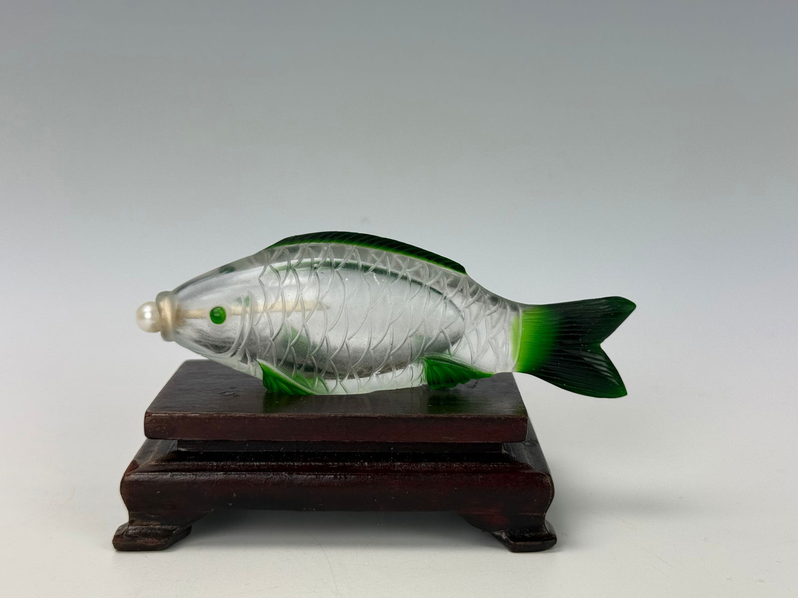 Vintage Fish Shape Peking Glass Snuff Bottle: Vintage Fish Shape Peking Glass Snuff Bottle, W 10 cm(4 in.).Preview from Apr 20th to 24th from 1:00 PM TO 5:00 PM Eastern Time, Location: 15229 Display Court, Rockville, MD 20850.