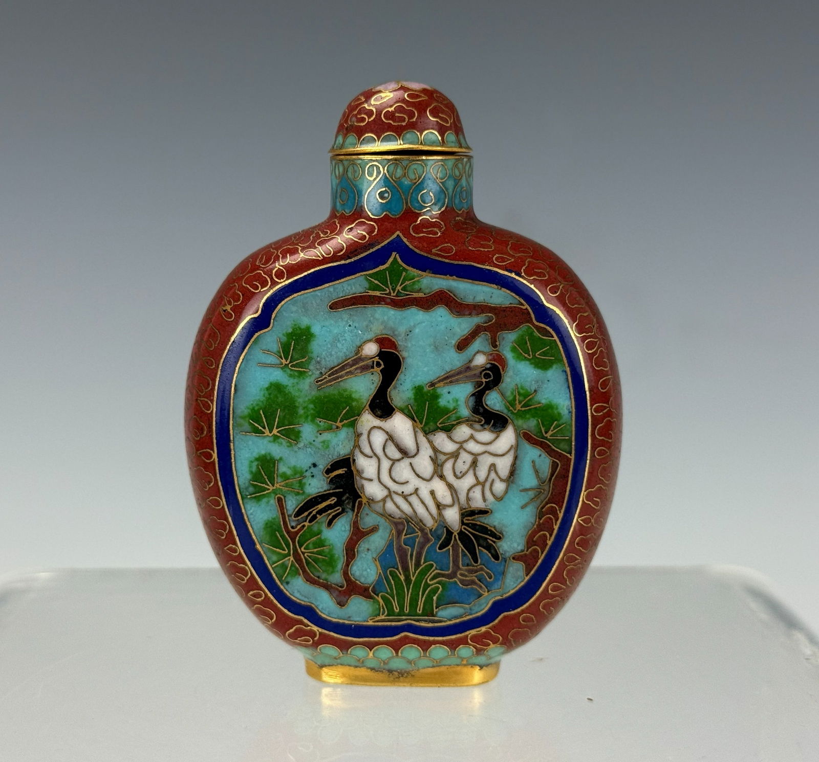 A Chinese Cloisonne Enamel Snuff Bottle: A Chinese Cloisonne Enamel Snuff Bottle,H 7.5 cm.Preview from Apr 20th to 24th from 1:00 PM TO 5:00 PM Eastern Time, Location: 15229 Display Court, Rockville, MD 20850.
