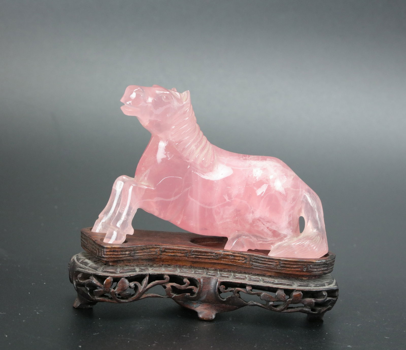 A Chinese Carved Rose Quartz Stone Horse Figurine: A Chinese Carved Rose Quartz Stone Horse Figurine,size 9 x6 x2 cm.Preview from Apr 20th to 24th from 1:00 PM TO 5:00 PM Eastern Time, Location: 15229 Display Court, Rockville, MD 20850.