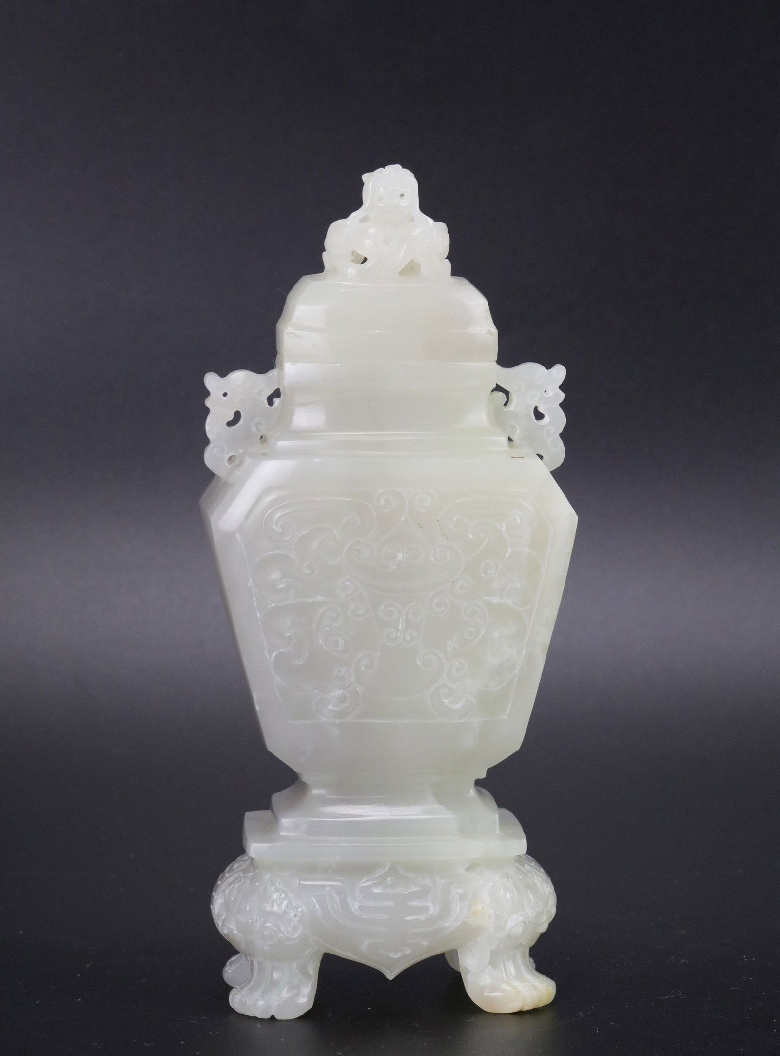 A Chinese Carved Jade Vase Lidded: A Chinese Carved Jade Vase Lidded,H16 cm(6.2 in.) x W 7 cm(2.8 in.) x D 4 cm(1.5 in.).Preview from Apr 20th to 24th from 1:00 PM TO 5:00 PM Eastern Time, Location: 15229 Display Court, Rockville, MD 2