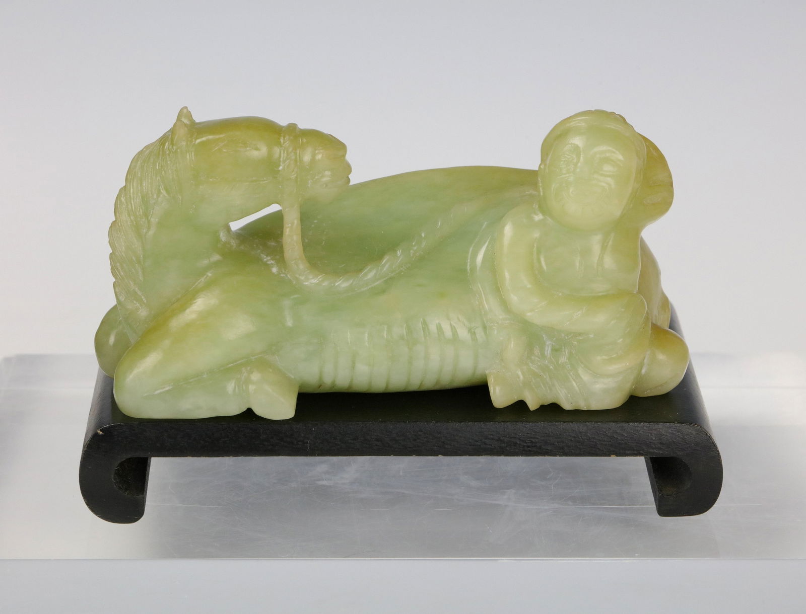 Chinese Celadon Jade Carved Horse and Groom: Chinese celadon jade Carved horse and groom, W 12 cm( 4.7 in.) x H 6 cm(2.5 in.) x D 6 cm( 2.5 in.) .Preview from Apr 20th to 24th from 1:00 PM TO 5:00 PM Eastern Time, Location: 15229 Display Court,