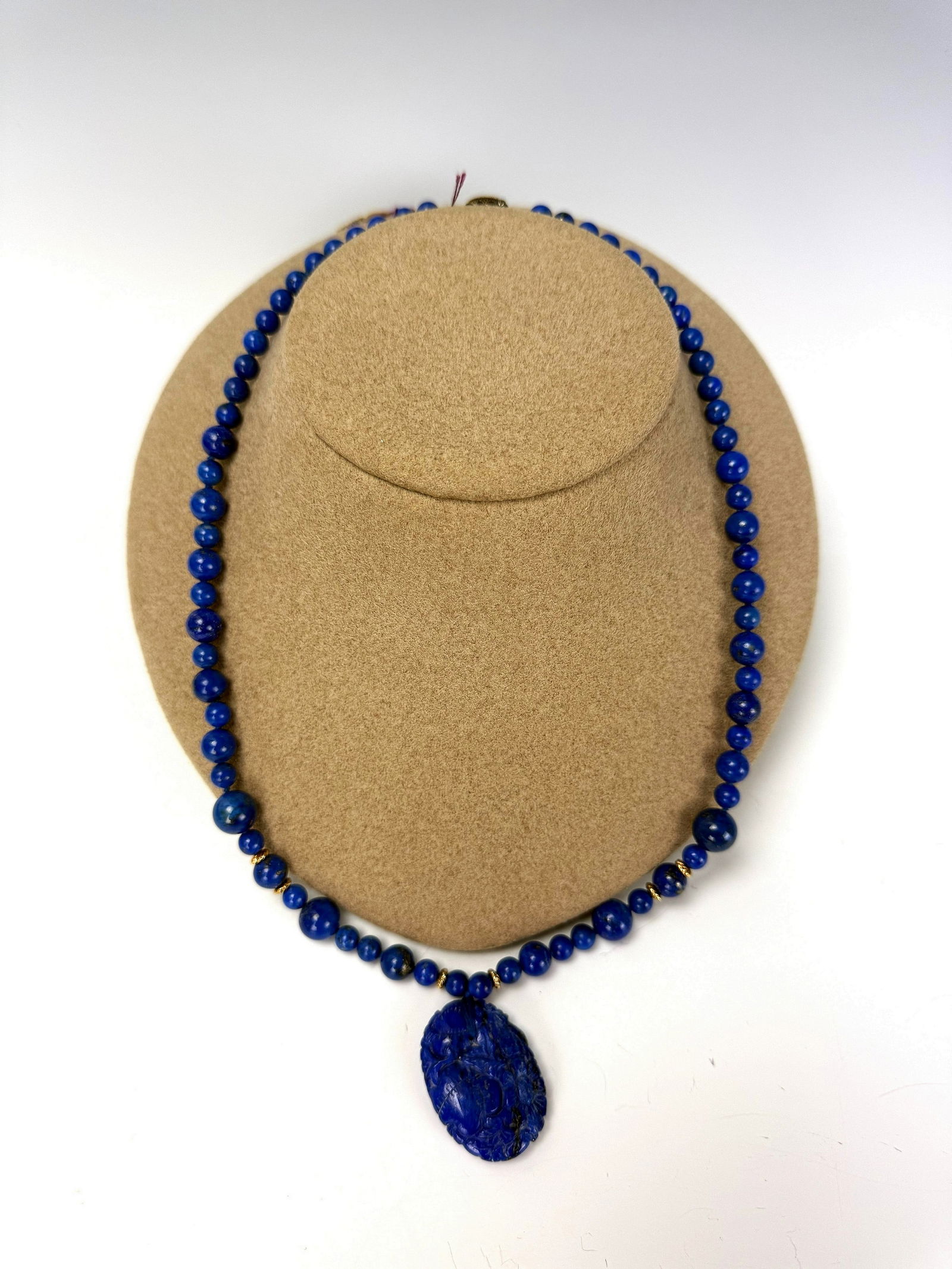 A Vintage Chinese Lapis Lazuli Necklace: A Vintage Chinese Lapis Lazuli Necklace,L 27 cm (10.5 in),Preview from Apr 20th to 24th from 1:00 PM TO 5:00 PM Eastern Time, Location: 15229 Display Court, Rockville, MD 20850.
