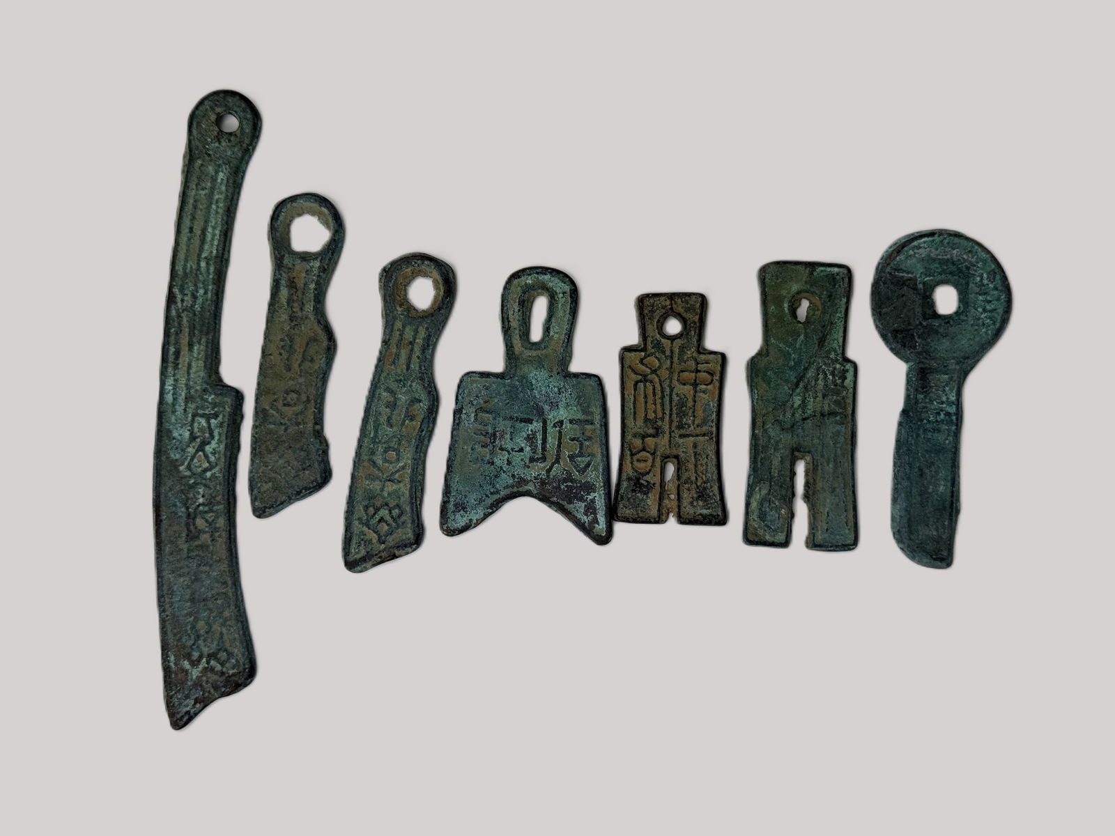 Group of 7 Ancient Chinese Bronze Spade Coins: Group of 7 Ancient Chinese Bronze Spade Coins,the longgest one L 11 cm (4.3 in),Preview from Apr 20th to 24th from 1:00 PM TO 5:00 PM Eastern Time, Location: 15229 Display Court, Rockville, MD 20850.