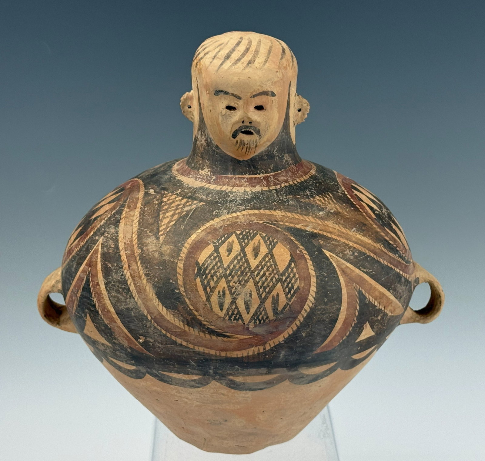 A Chinese Pottery Effigy Jar: A Chinese Pottery Effigy Jar. H 28 cm(11in) W28cm(11in),Preview from Apr 20th to 24th from 1:00 PM TO 5:00 PM Eastern Time, Location: 15229 Display Court, Rockville, MD 20850.